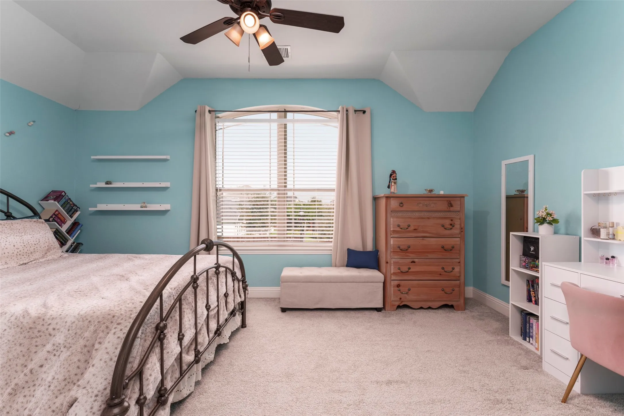 Secondary bedroom with large walk in closet