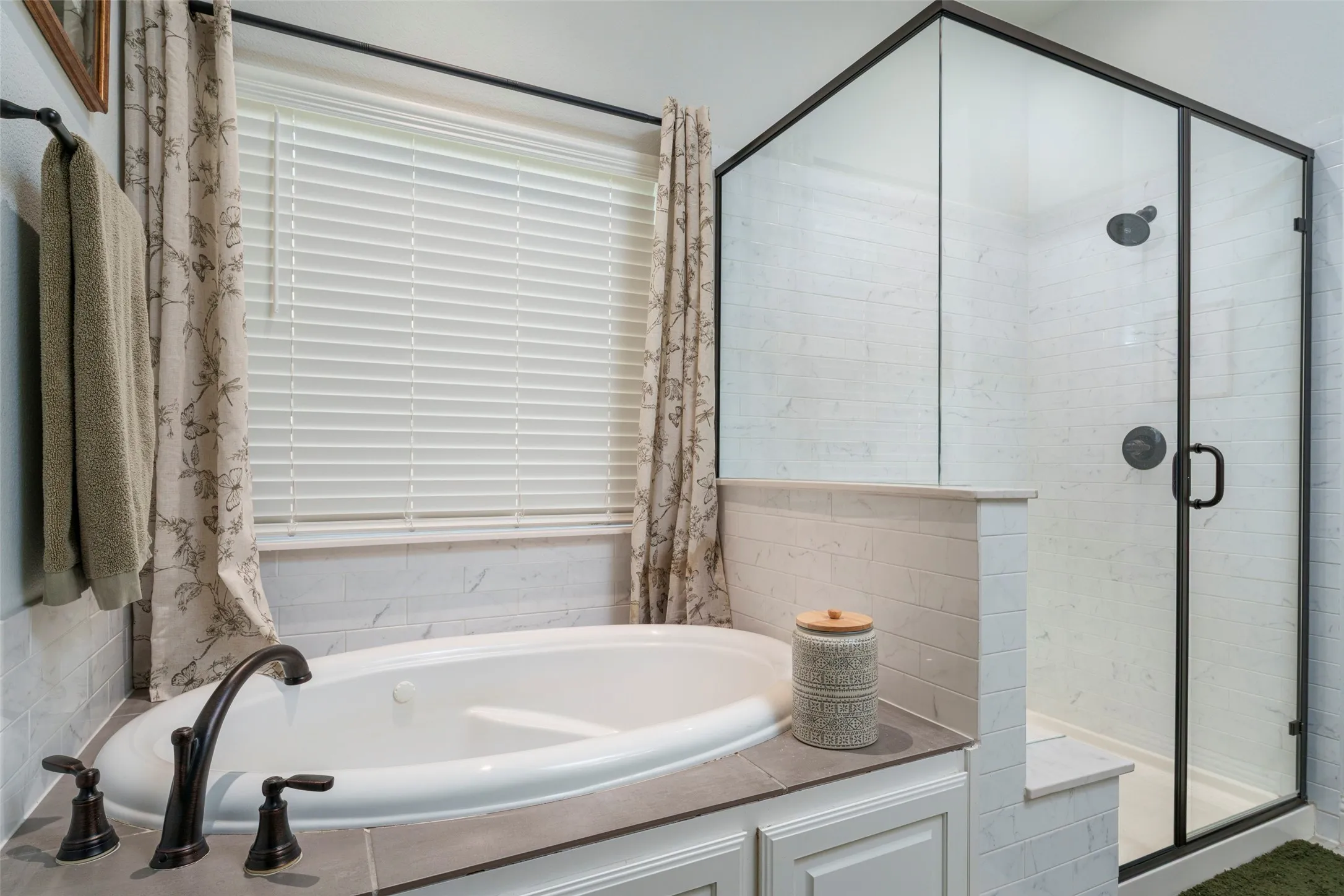 Who wouldn't want to soak in this garden tub or stand in this large hot shower after a long day?