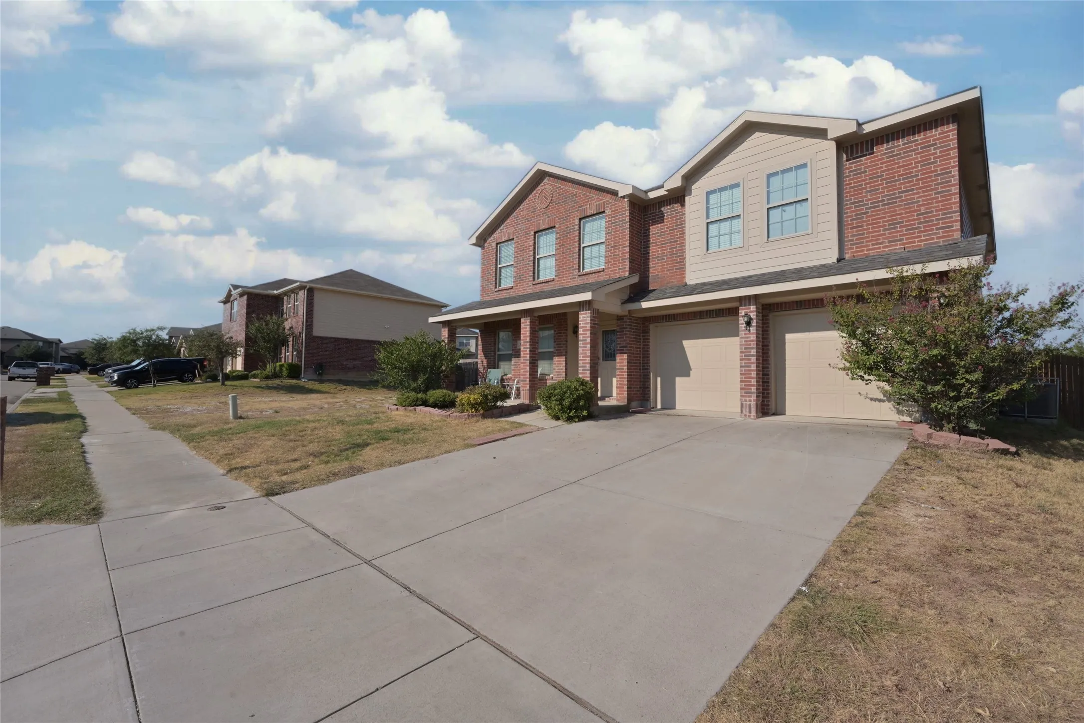 Front Elevation side view with two car garage