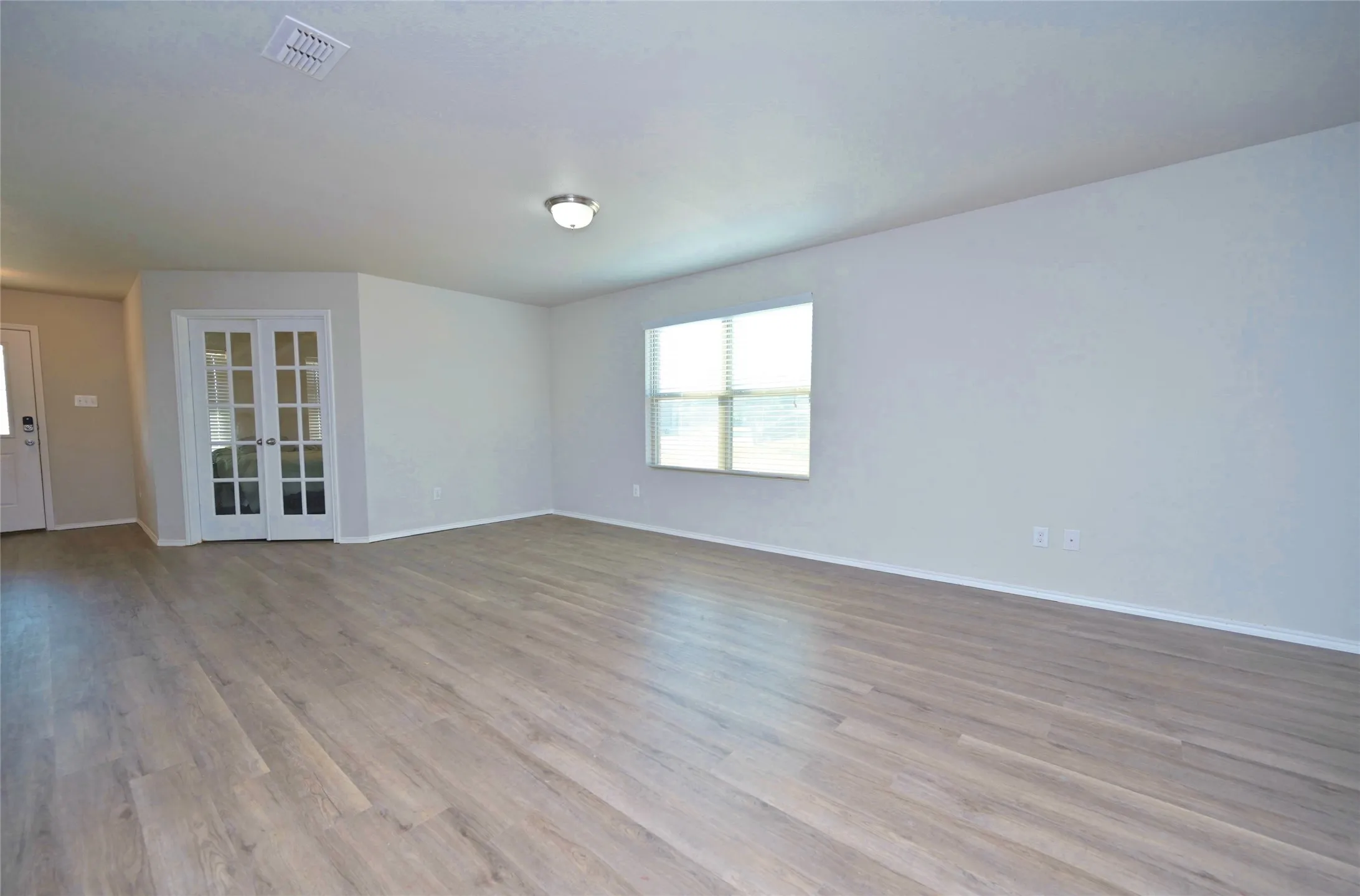 Living facing front entry & Office - Bedroom