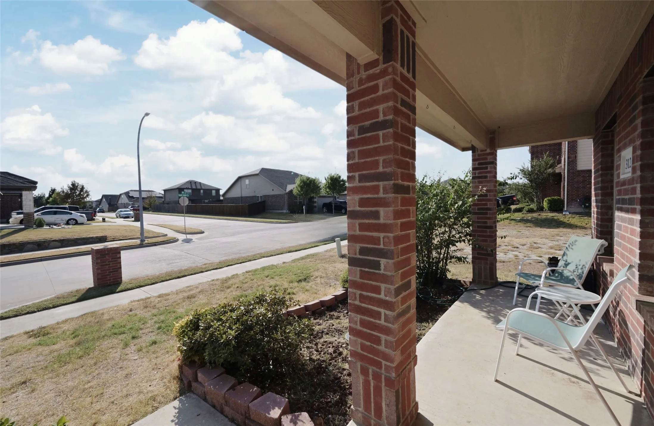 Covered front sitting porch