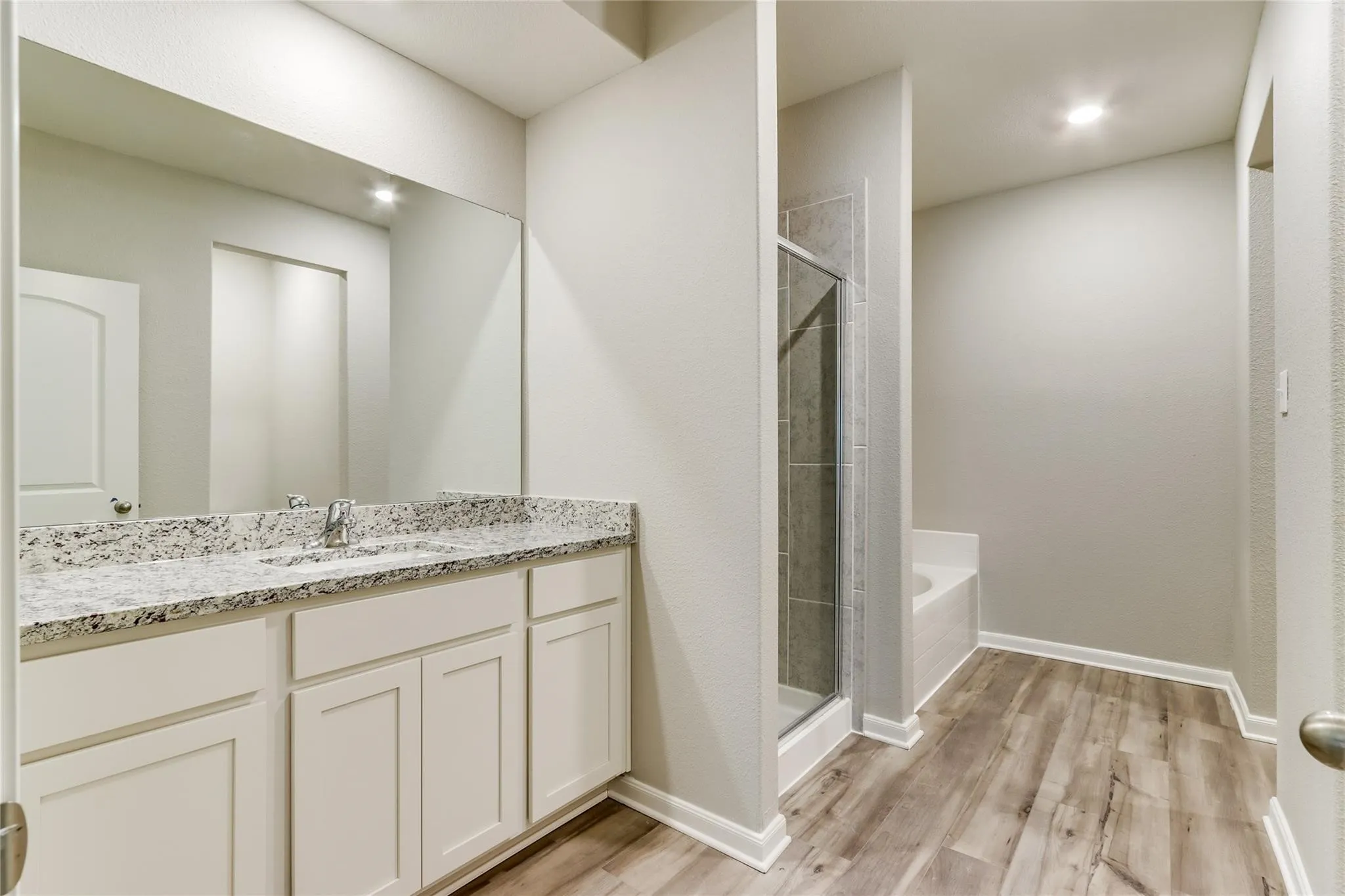 Wood-finish flooring throughout