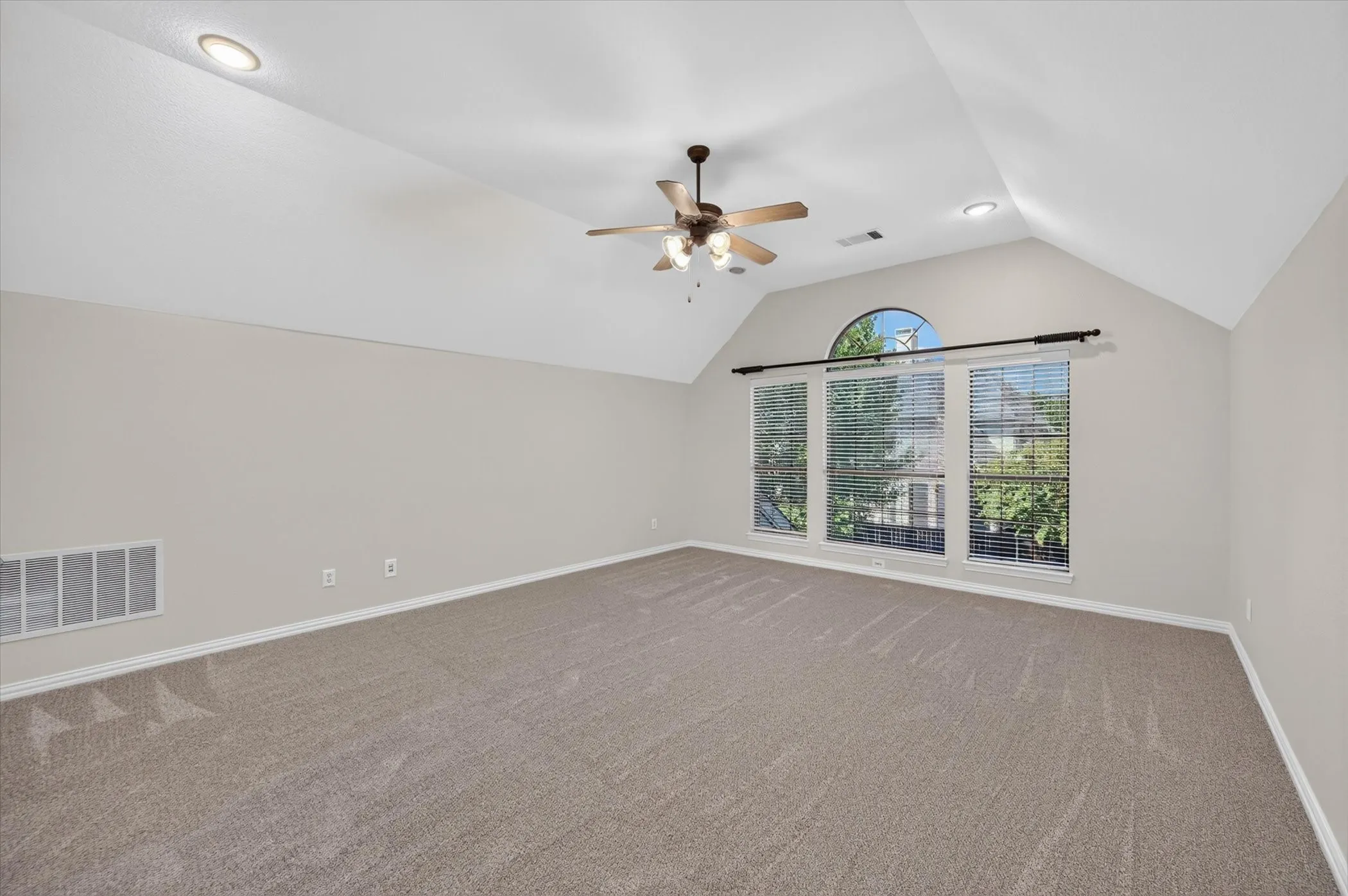 An expansive sunny upstairs bonus room gives you so many options