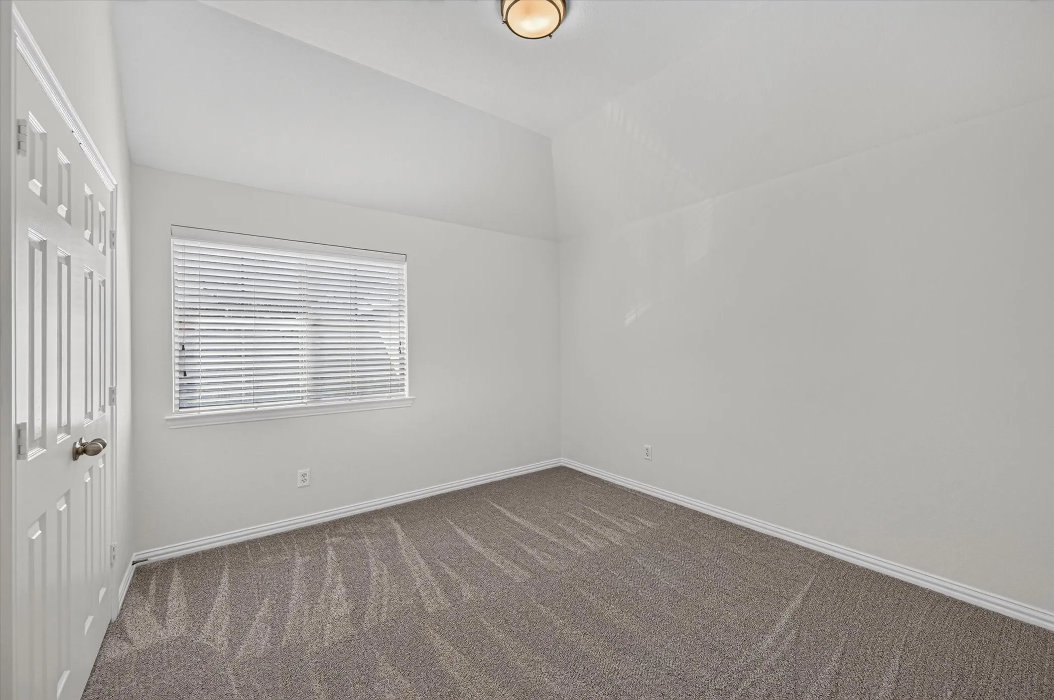 The third upstairs bedroom is large and conveniently located across from the hall bathroom