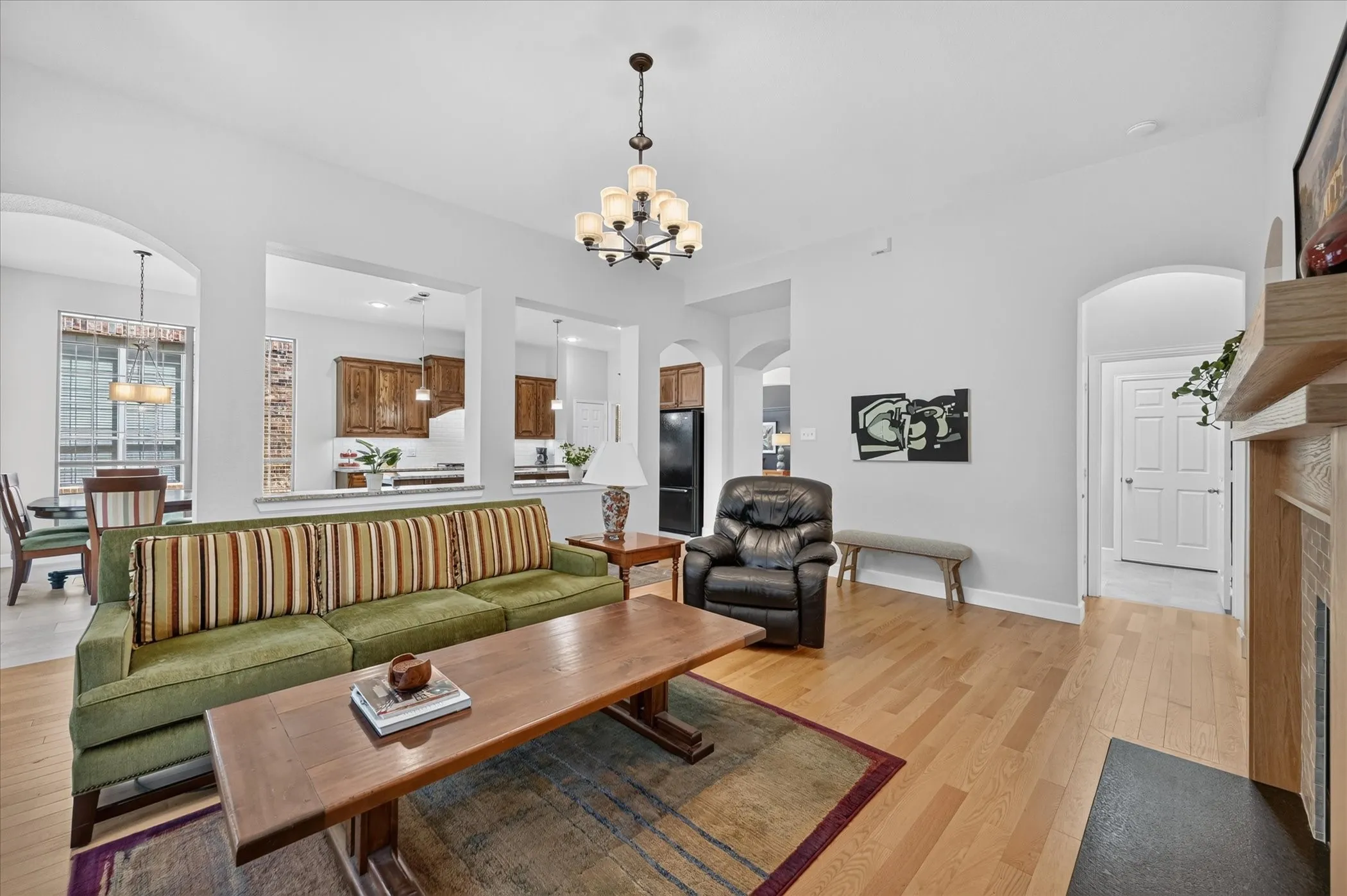 Beautiful wood floors enhance the main living spaces of the first floor