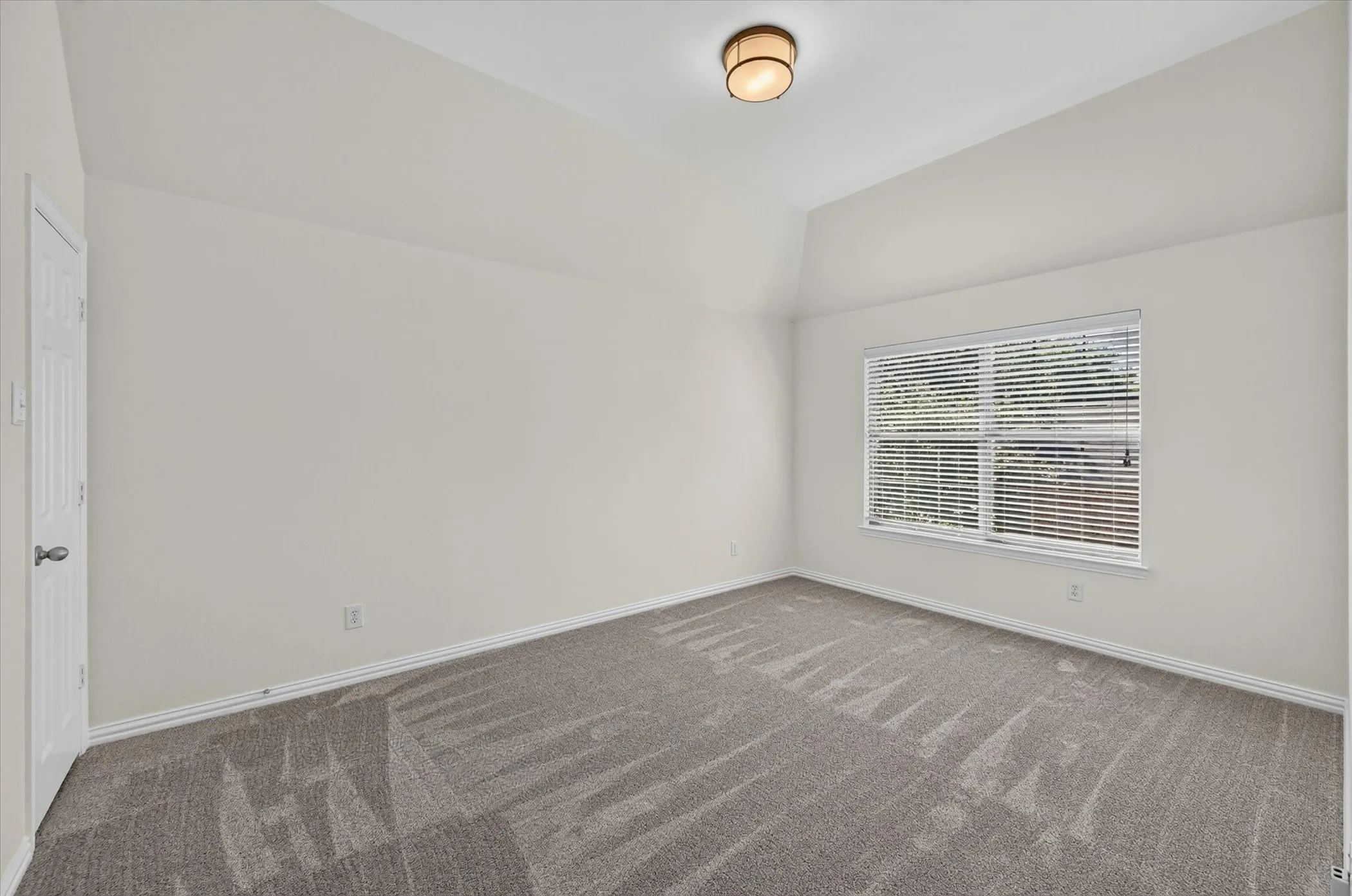 This large bedroom was used as an office, but has a sizable walk-in closet.