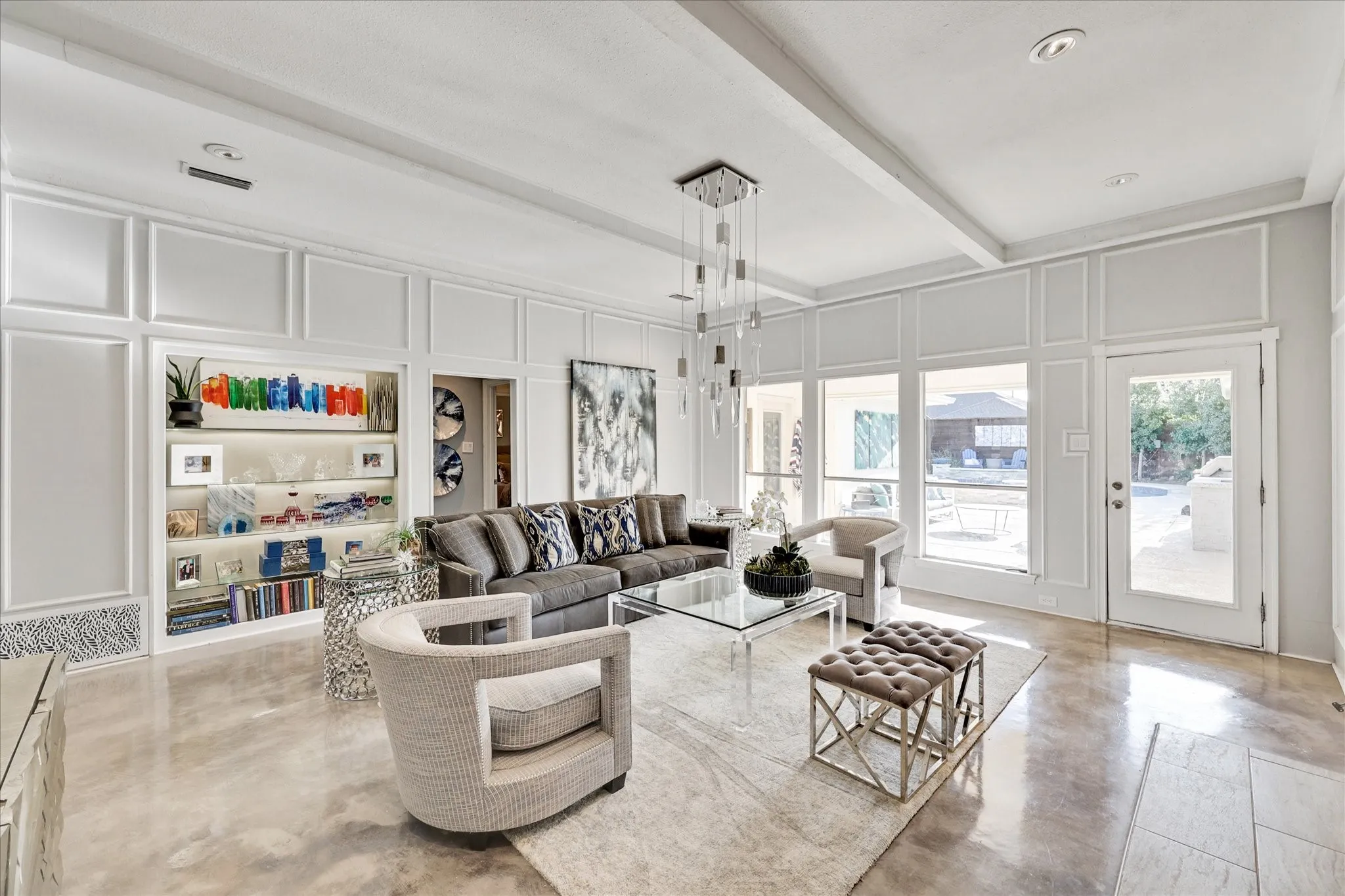 Recessed lighting, crown molding, and panel molding details