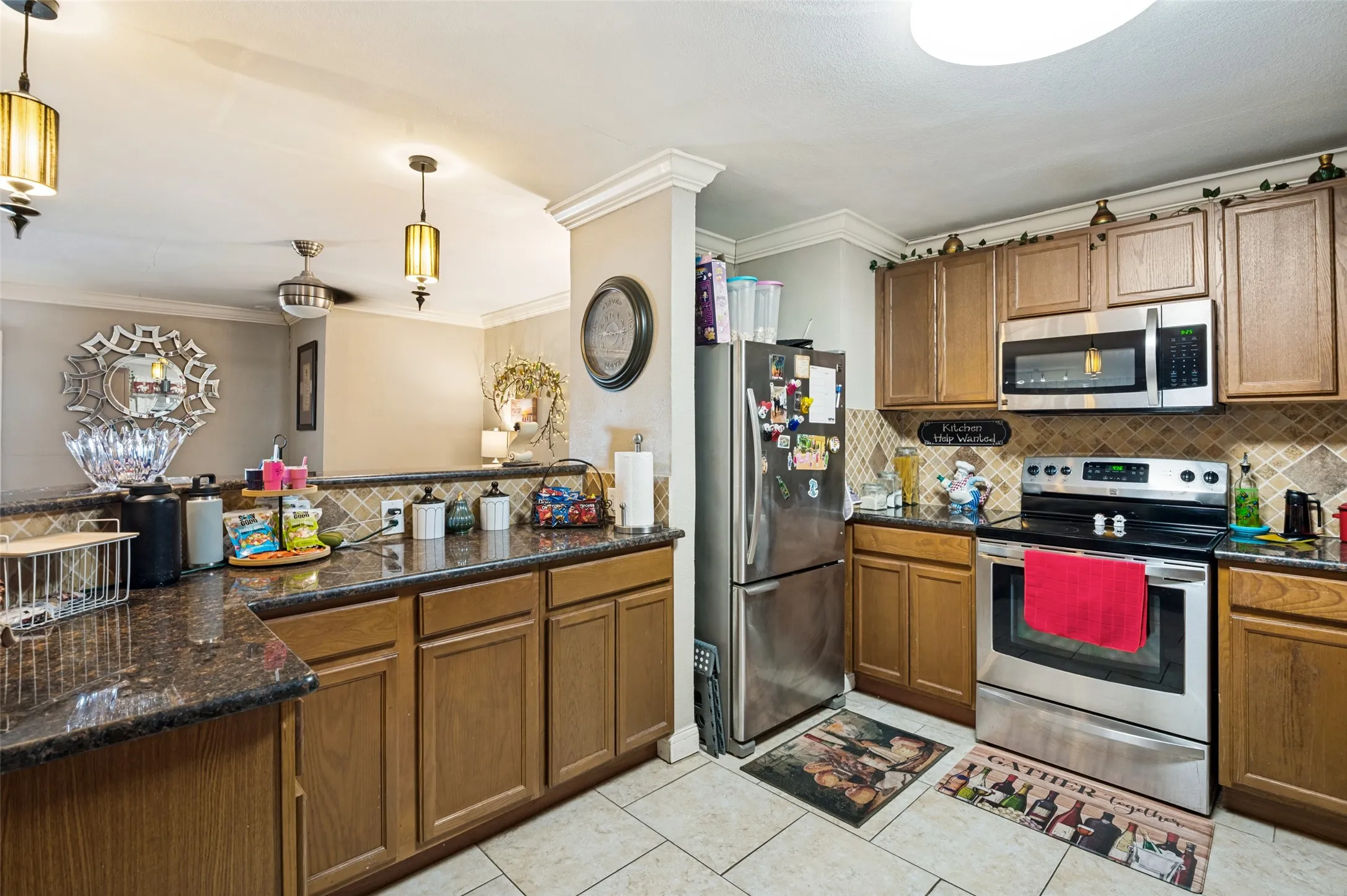Granite Countertops and stainless steel make this kitchen adorable