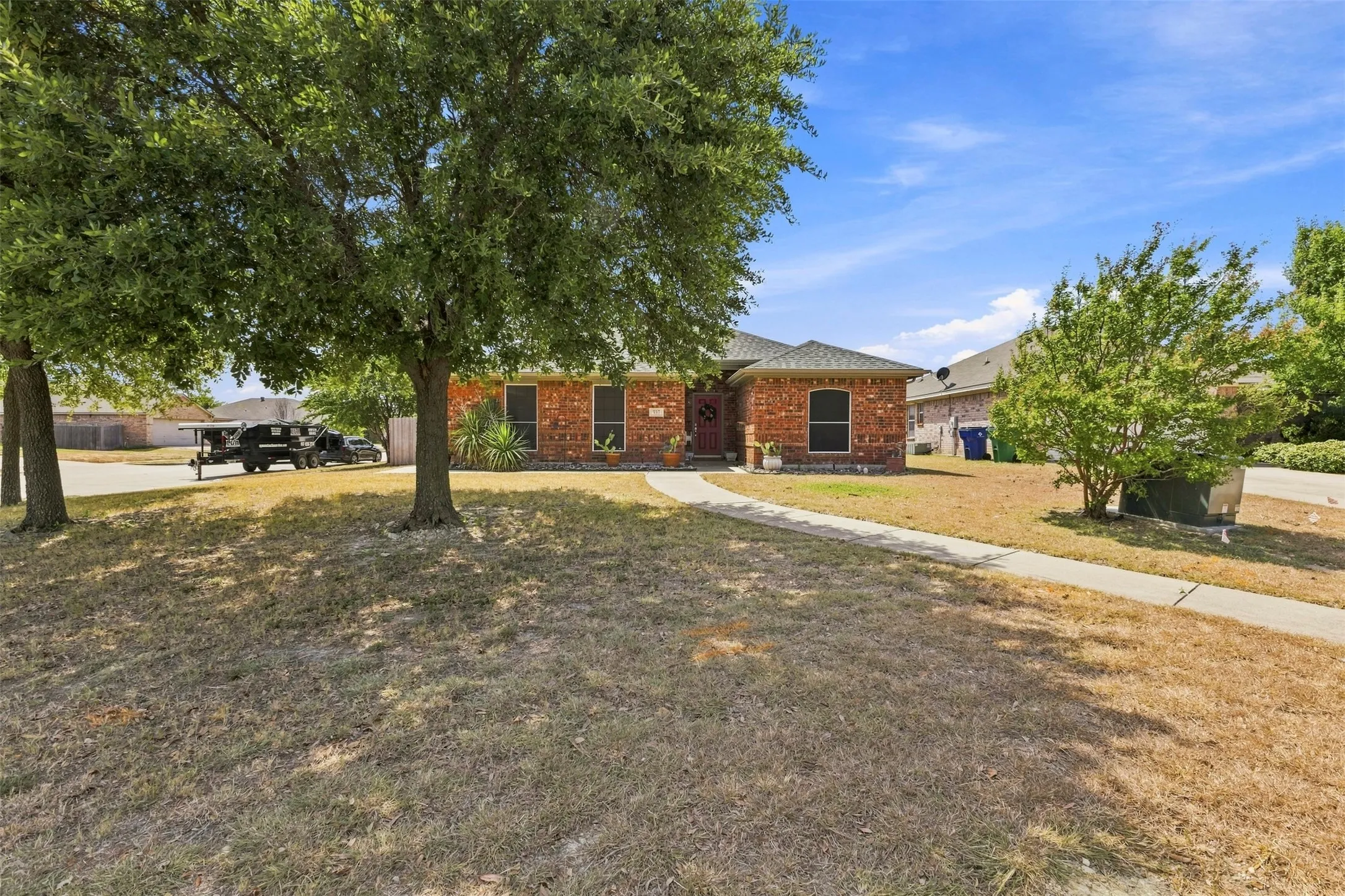Situated on a desirable corner lot in a quiet cul-de-sac, this home offers a great combination of privacy, functionality, and easy access to everything you need.