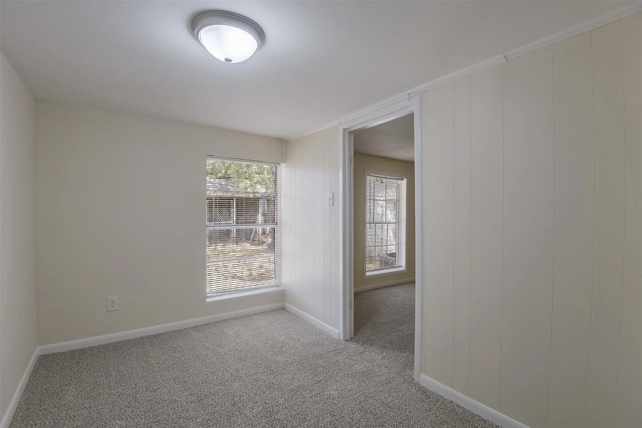 This is off the primary bedroom and could be an XL closet, work out space, home school room, or office! You decide!