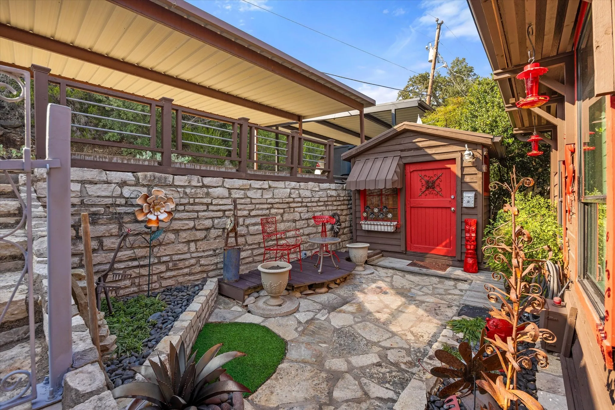Front patio area and storage shed