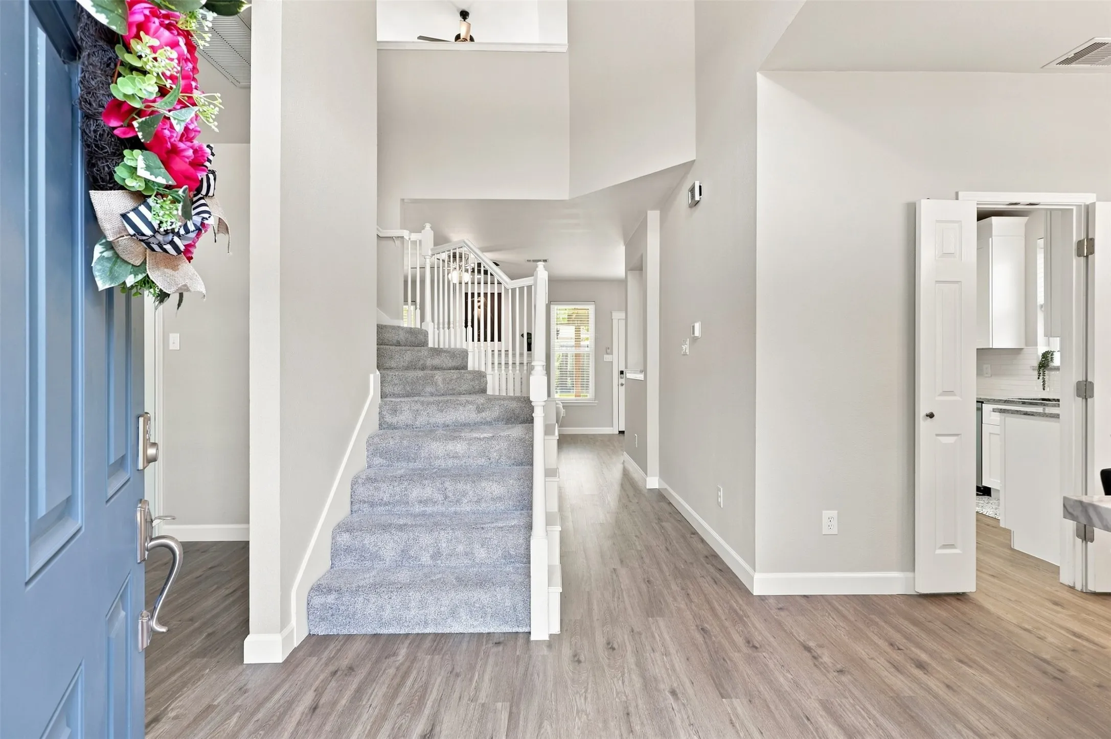 Open the door to this beautiful 2-story home with luxury vinyl plank throughout the main living areas.