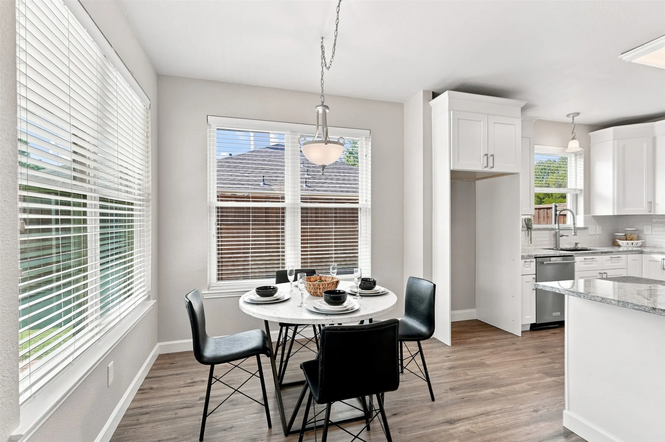 Luxury Vinyl Plank extends to dining area and thru the main living areas.