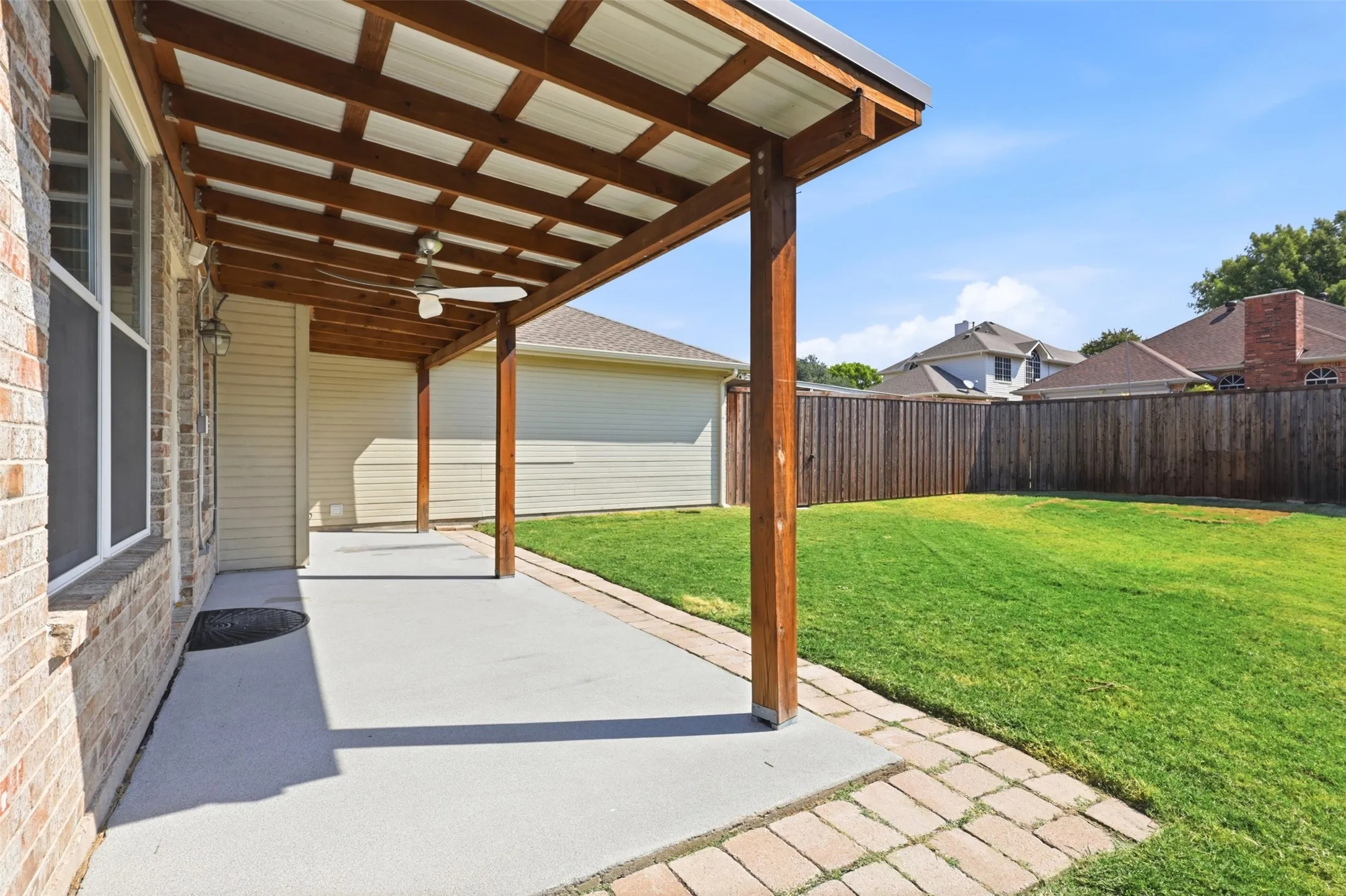 Large covered back porch perfect for relaxing in the shade after a long day.