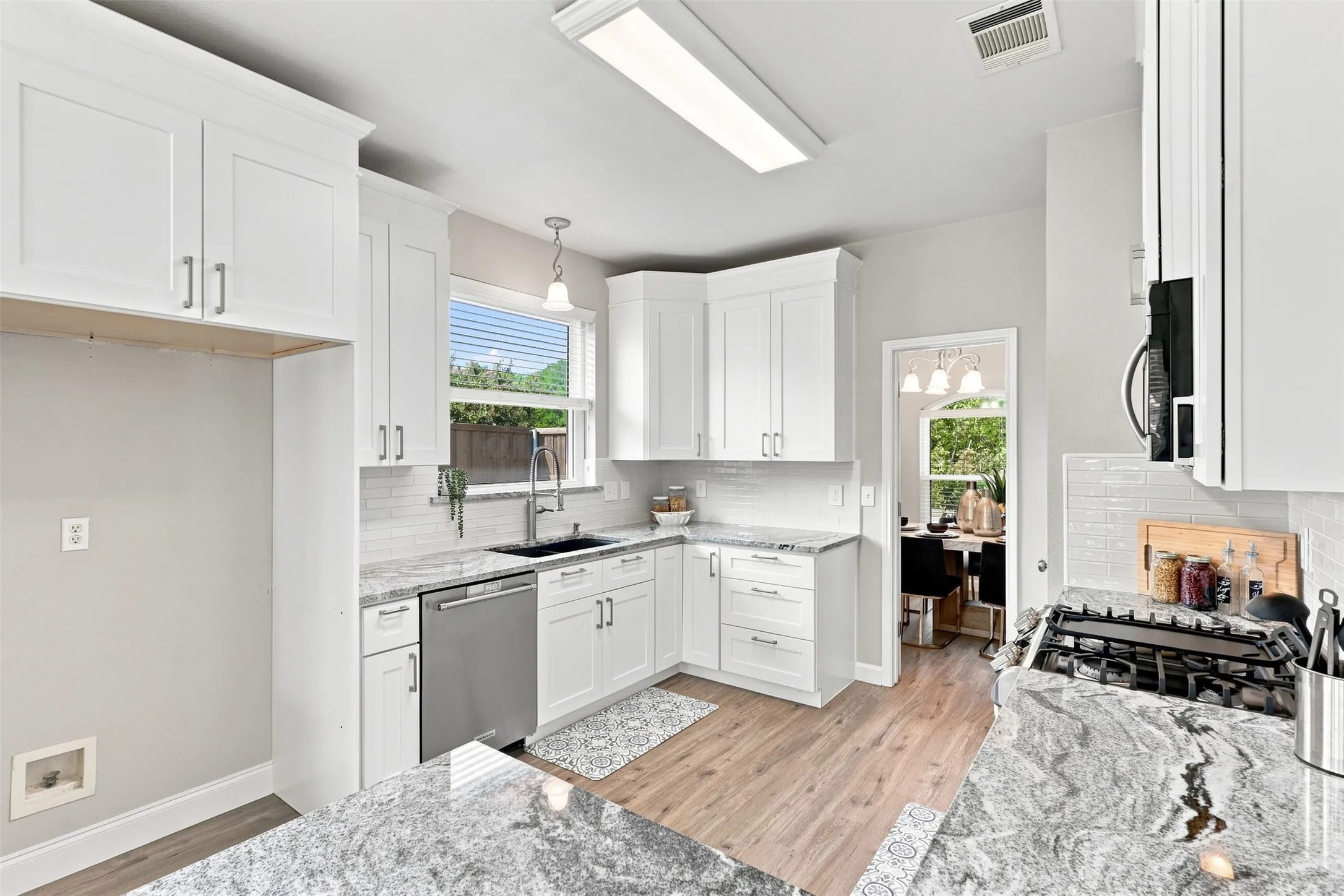 Gas Range makes cooking a delight with plenty of counter space for meal prep.