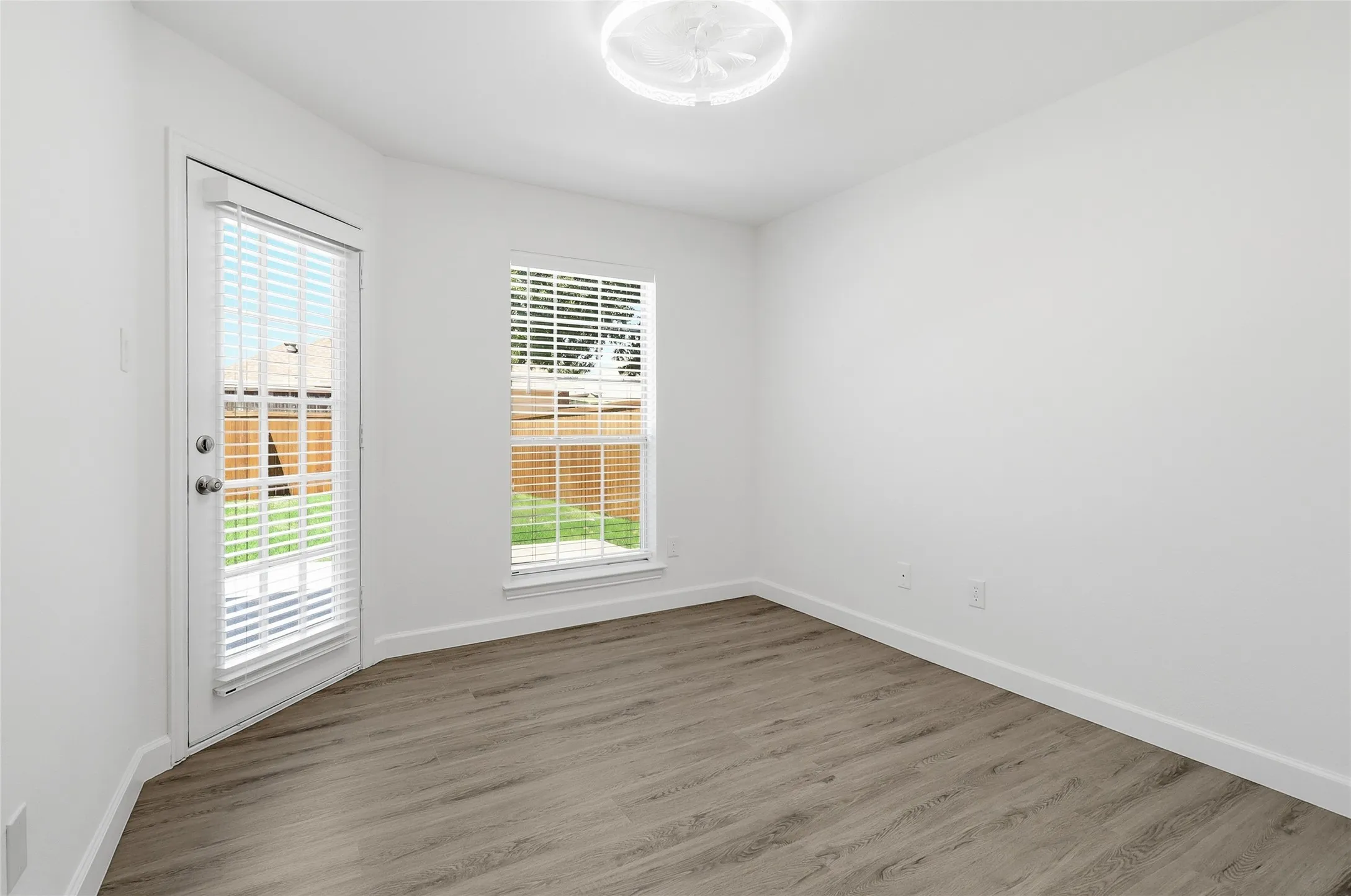 Rear Bedroom with a door