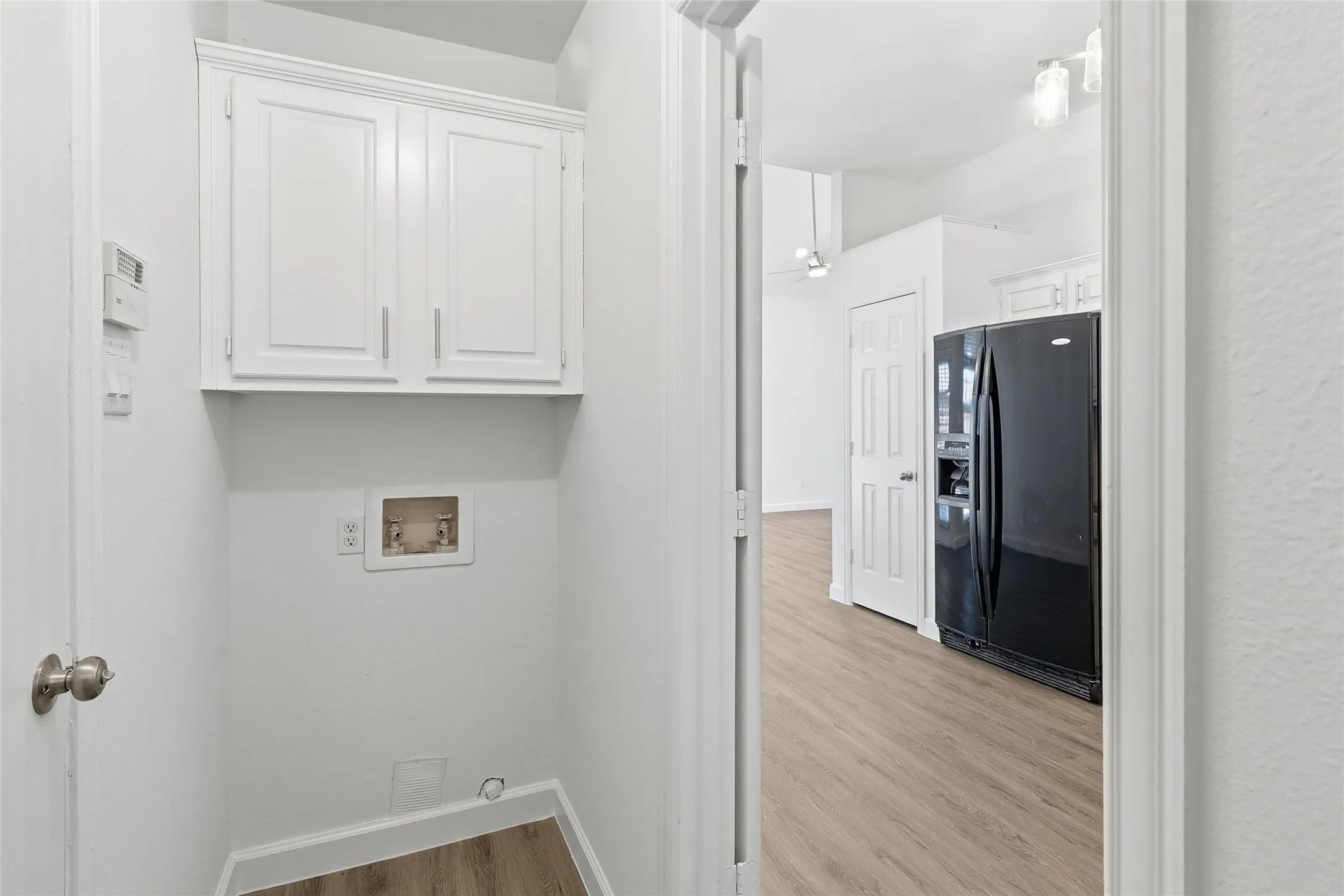 Full size washer and dryer area