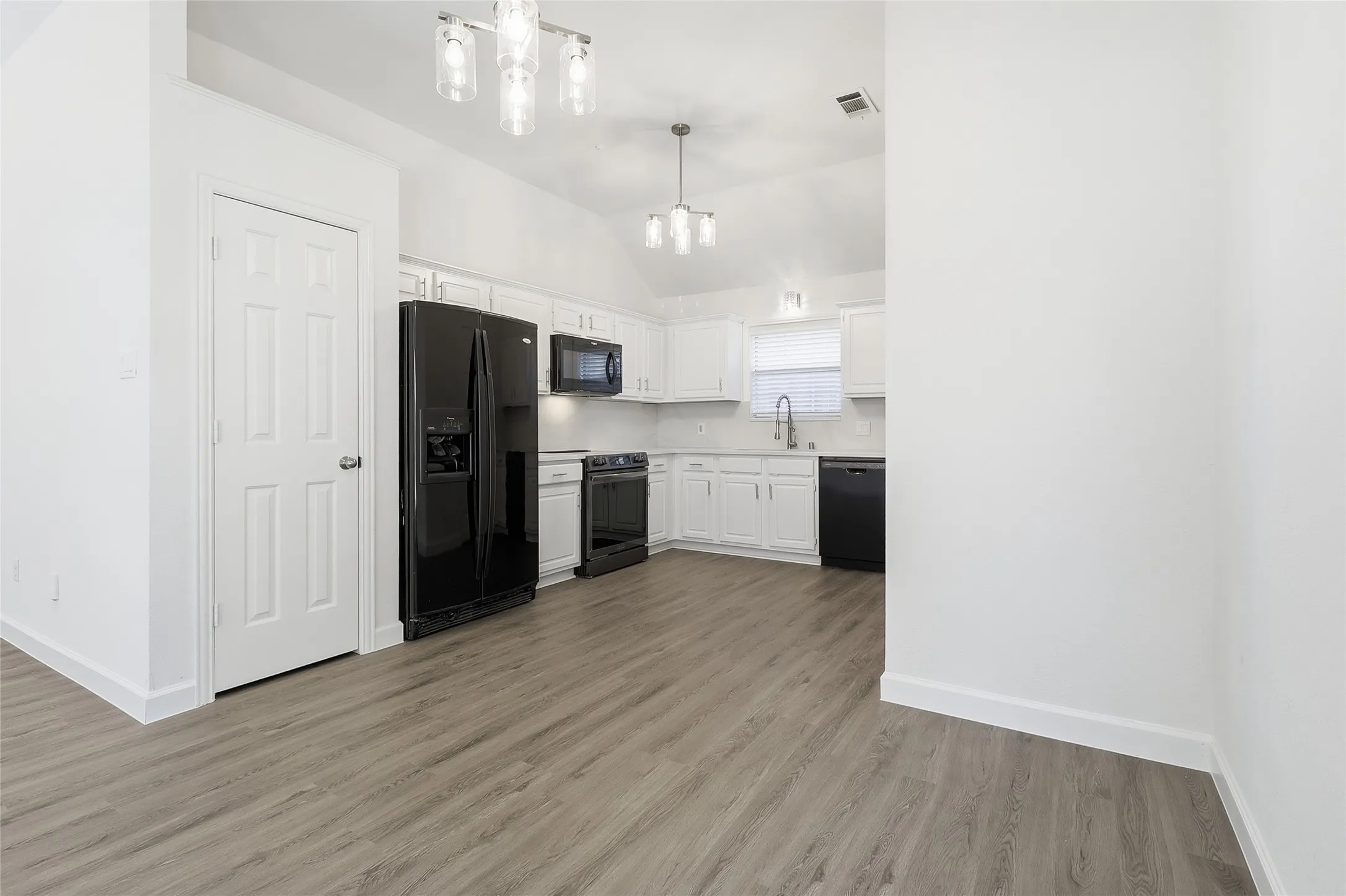 Nice pantry and great ceilings