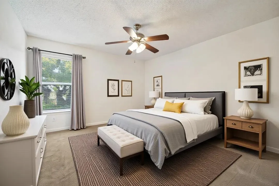 Carpeted flooring, window with blinds, ceiling fan with integrated lighting, textured ceiling