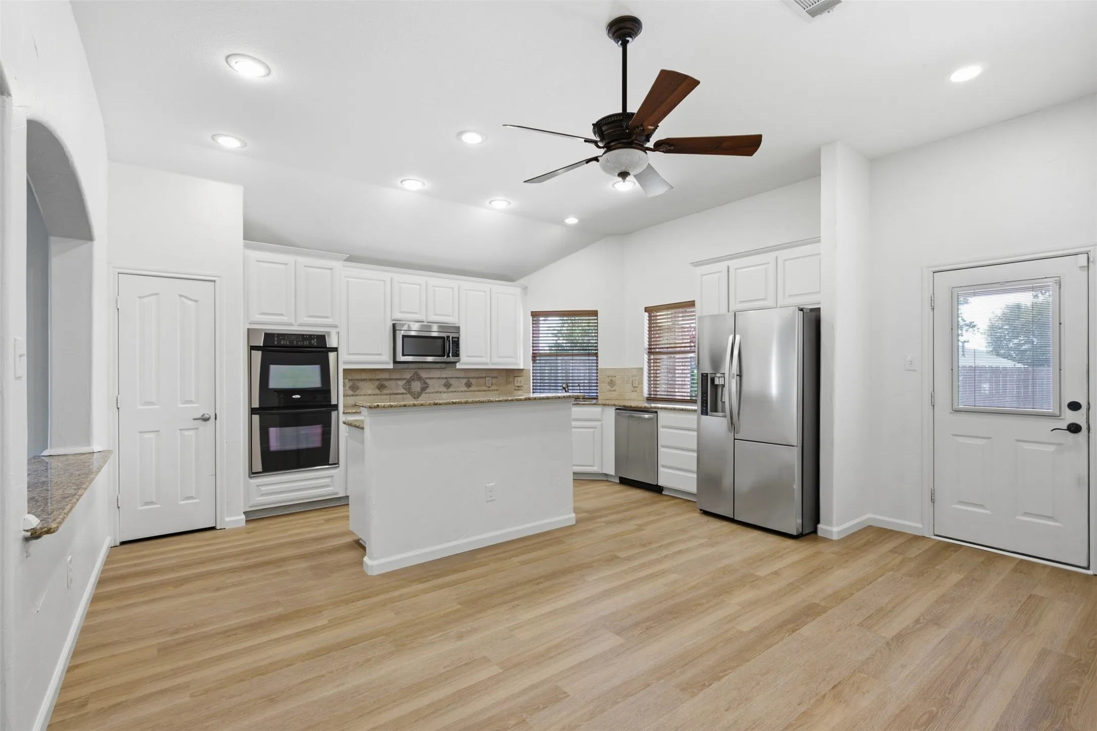 Double ovens, gas cooktop, eat-in kitchen, new dishwasher and the refrigerator will remain at 10232 Ash Creek Lane listed by Seth Fowler of Williams Trew Real Estate