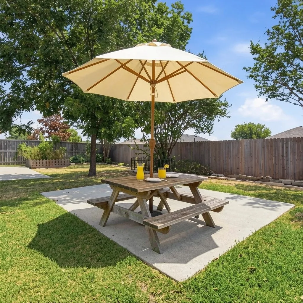 Uncovered patio perfect for lemonade and shade at 10232 Ash Creek Lane listed by Seth Fowler of Williams Trew Real Estate