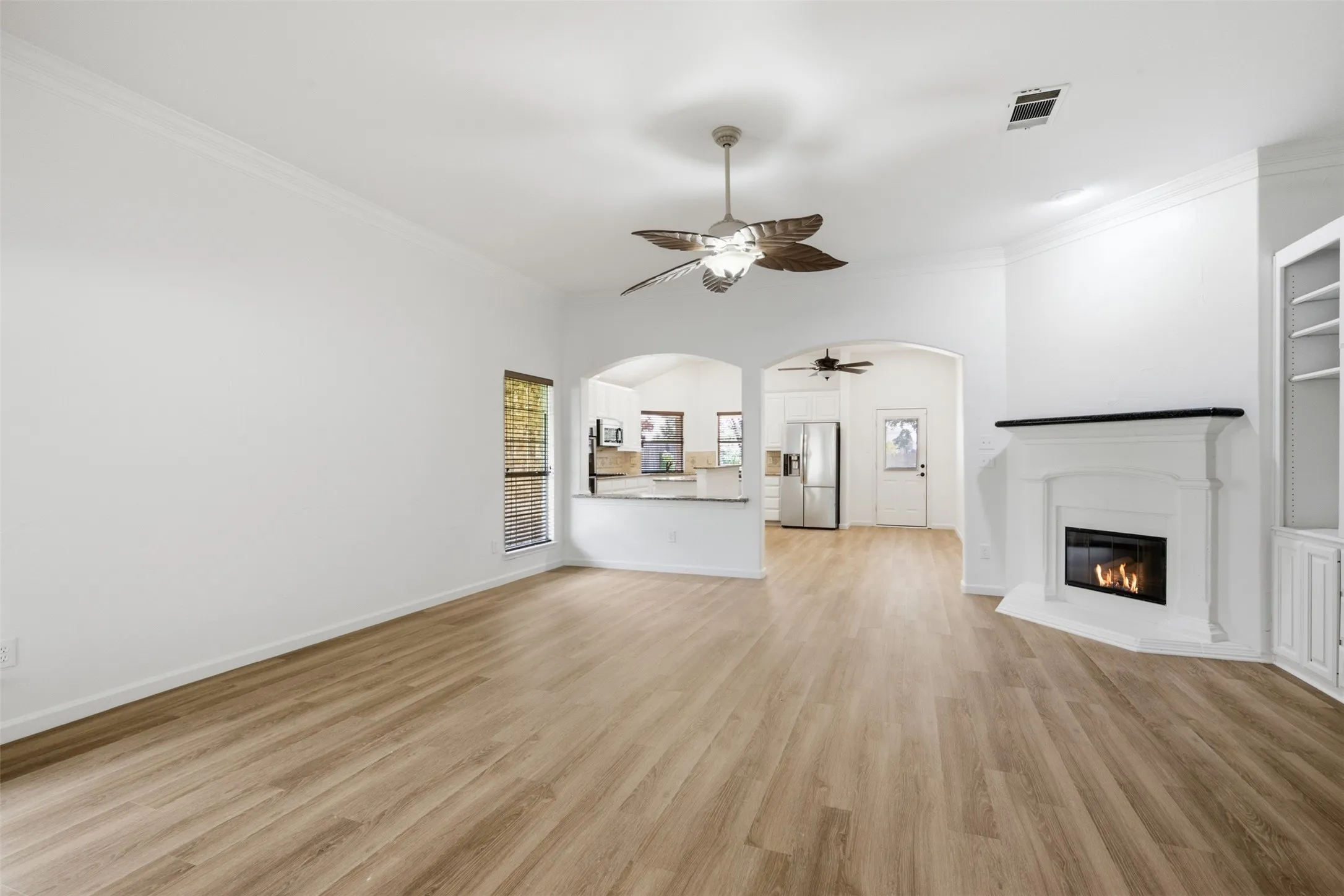 Brand new luxury vinyl plank flooring throughout the home, freshly painted walls give this home a light and bright move-in ready look at 10232 Ash Creek Lane listed by Seth Fowler of Williams Trew Real Estate