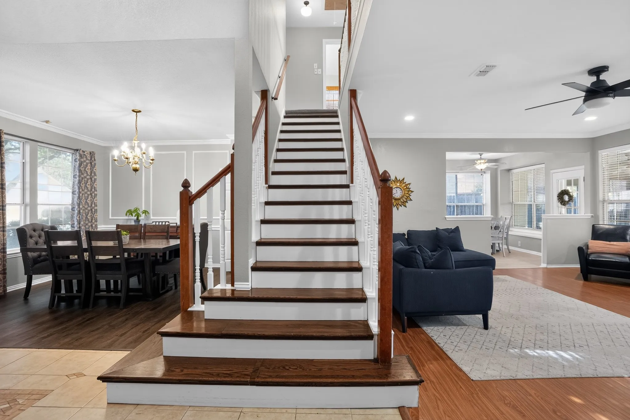Wood staircase leading to the secondary bedrooms and living room