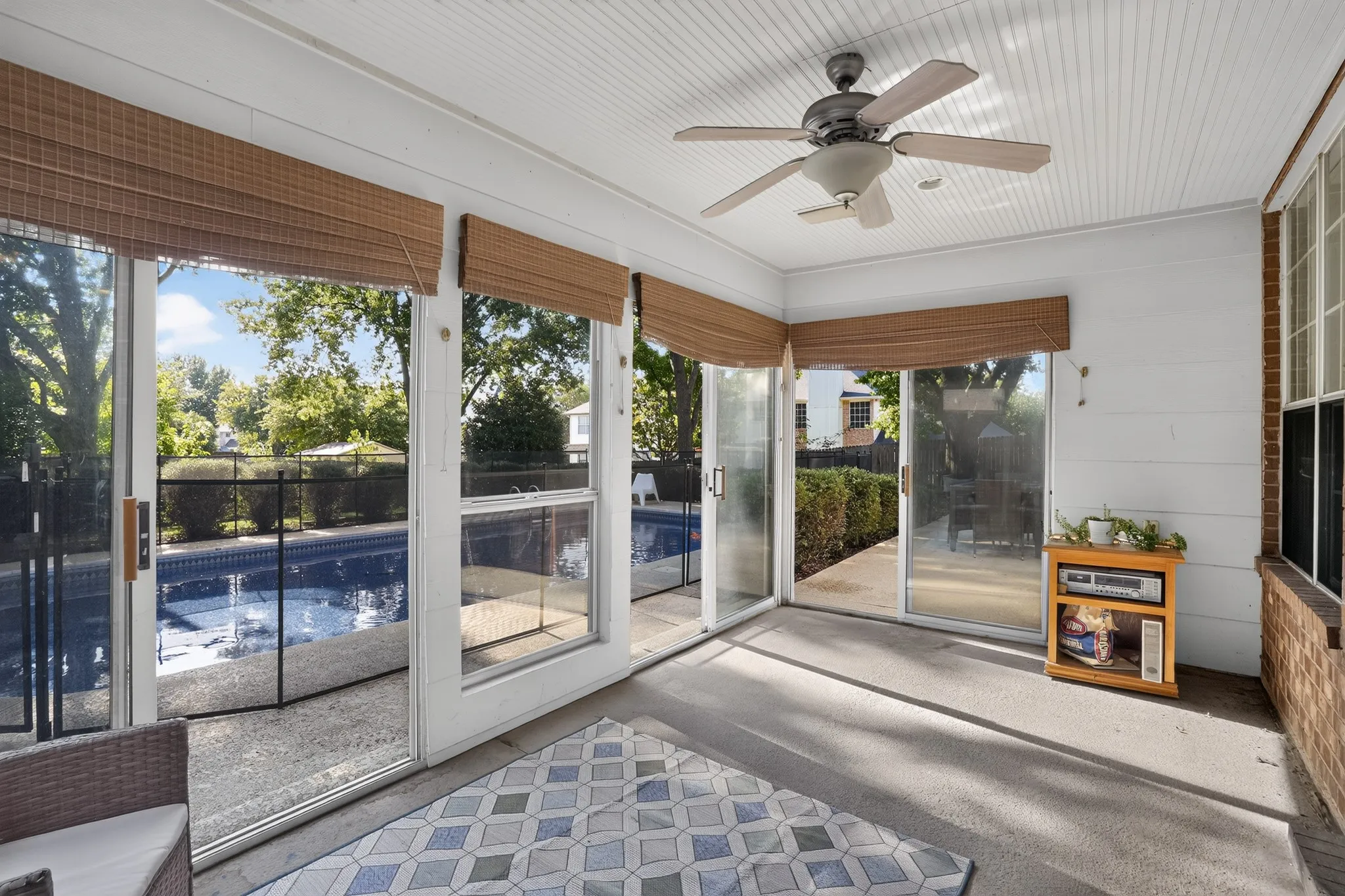 Enclosed patio off of the kitchen and family room