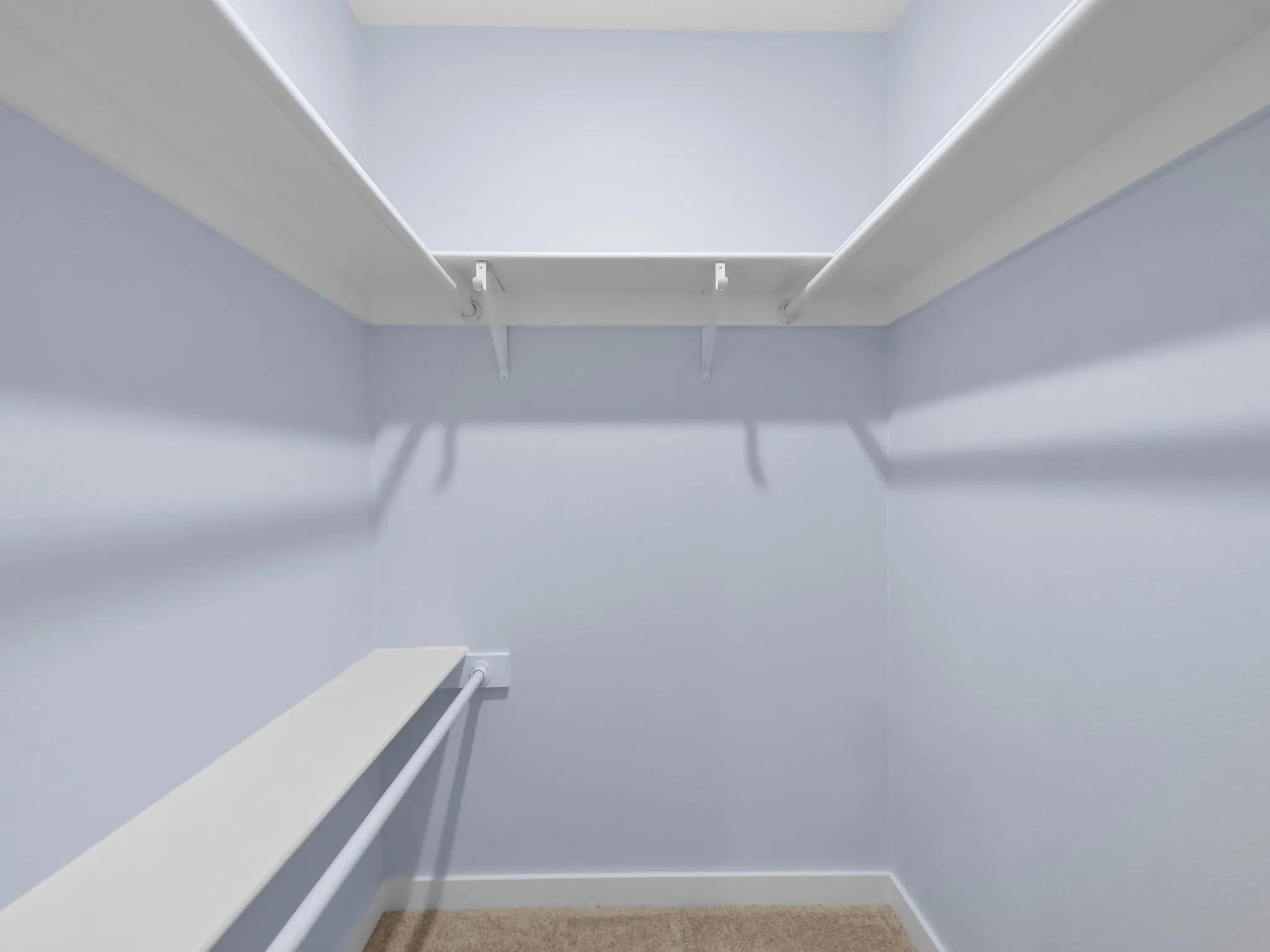 Primary Bedroom-Built-in shelving and hanging rods