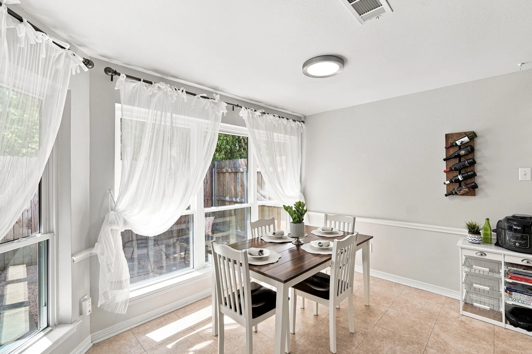 These light and airy curtains remain with the home