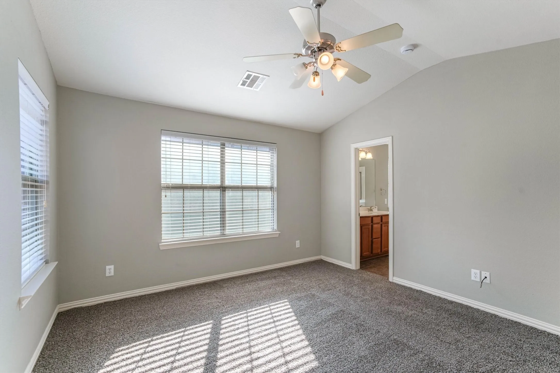 Fresh carpet, ceiling fan, and ensuite bathroom