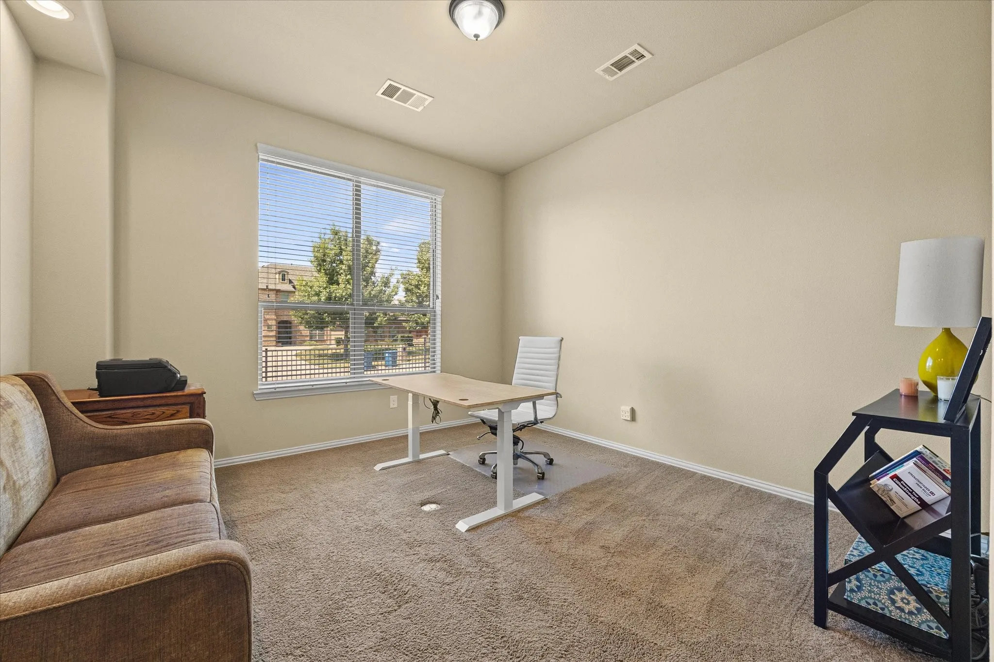 Wall-to-wall carpeting and neutral wall tones