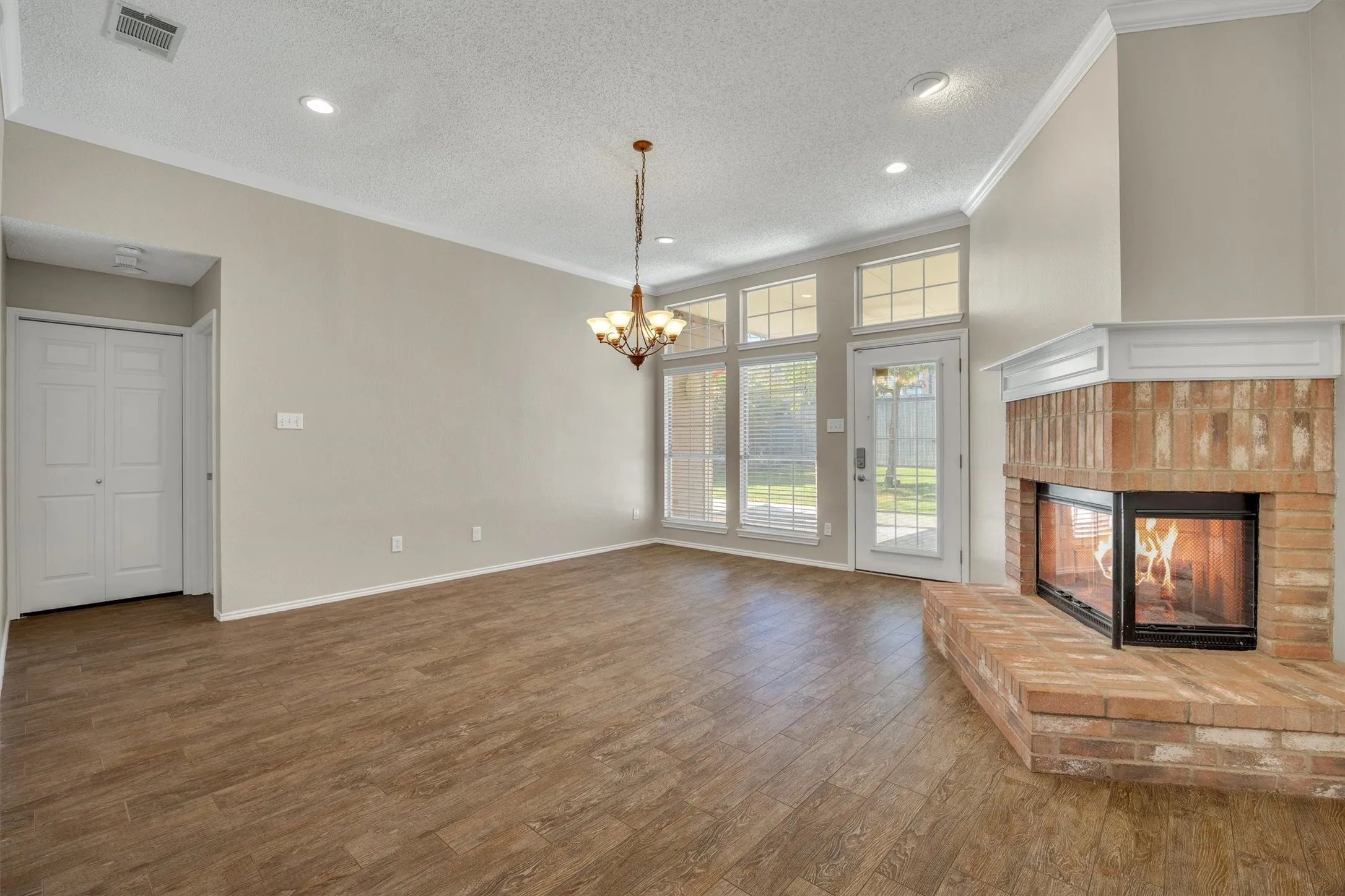 Family room with kitchen behind you - fireplace can be seen from both!