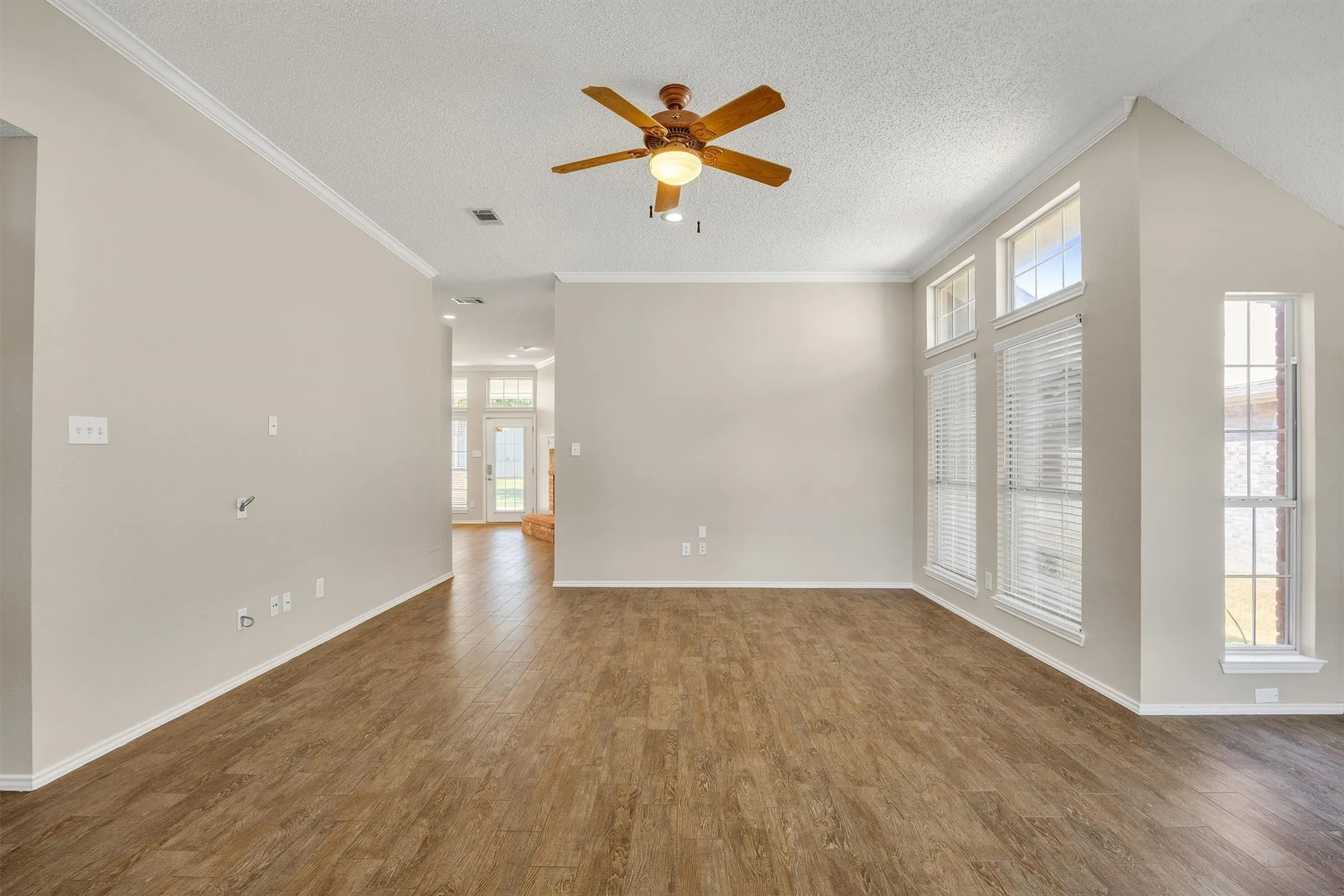 Looking from front door towards kitchen...bedrooms 2-4 on the left.