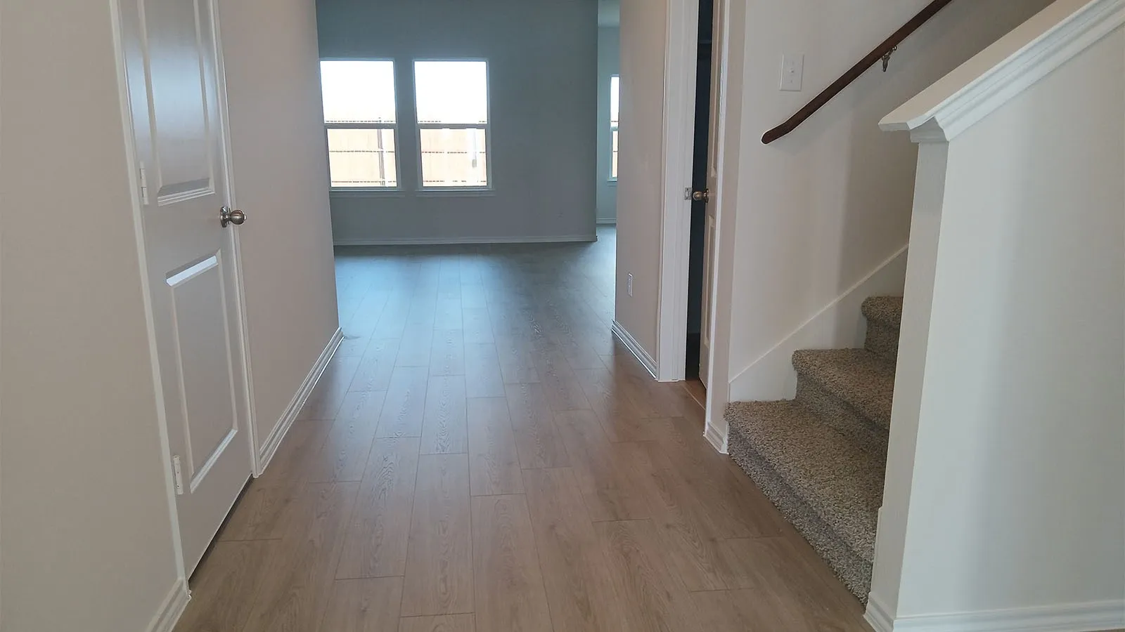 Wood-finish flooring throughout the main area