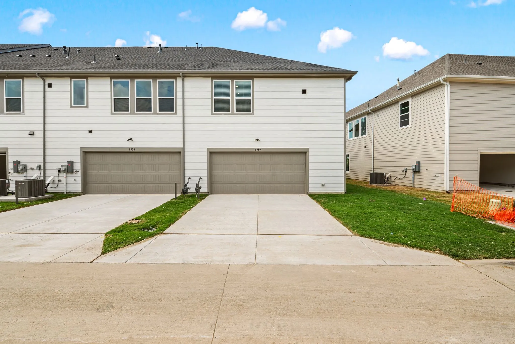 Two car attached garage with Epoxidy Floor and alley entrance