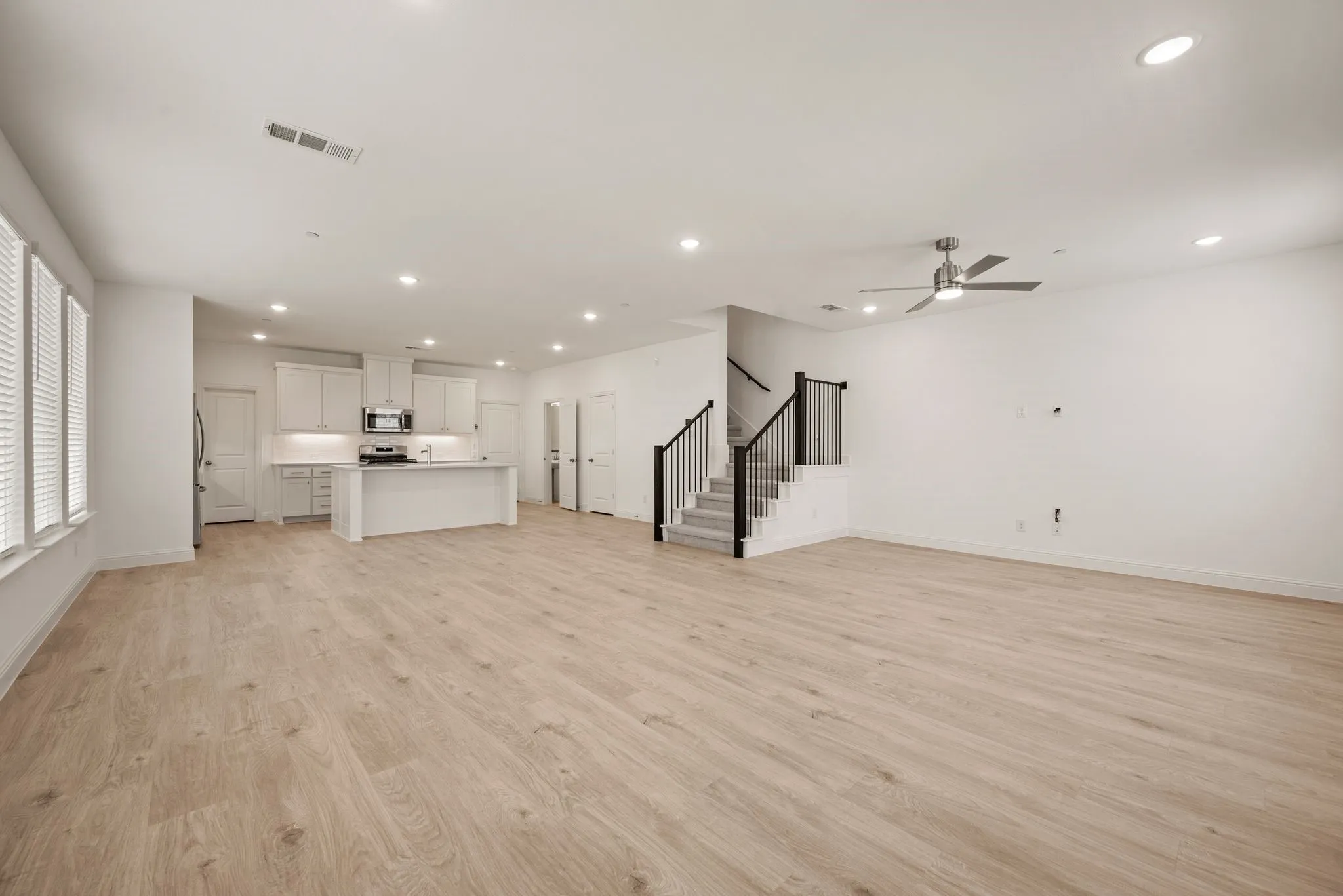 View from front door to kitchen and dining areas
