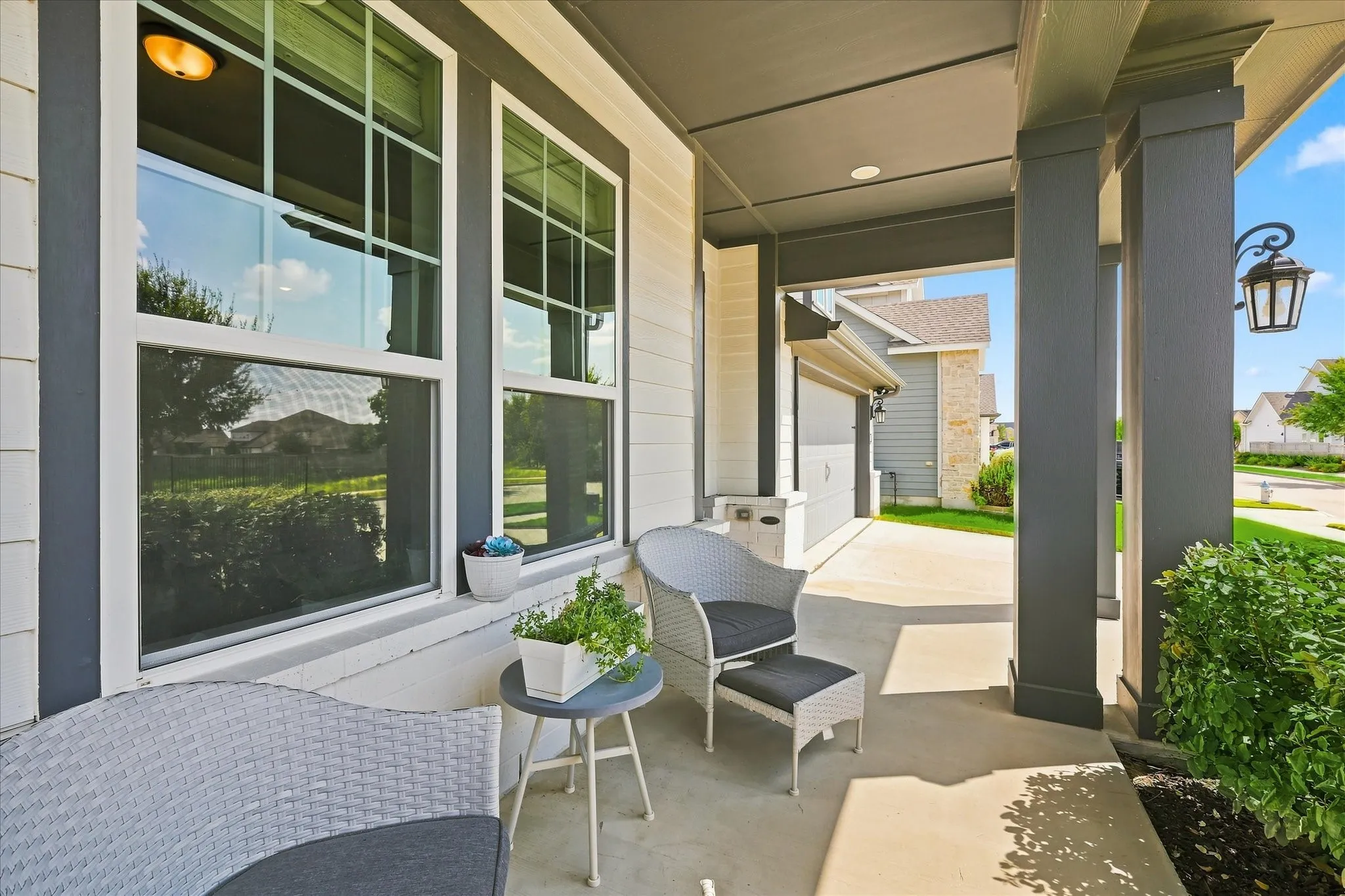 Enjoy your front porch with your favorite book and beverage