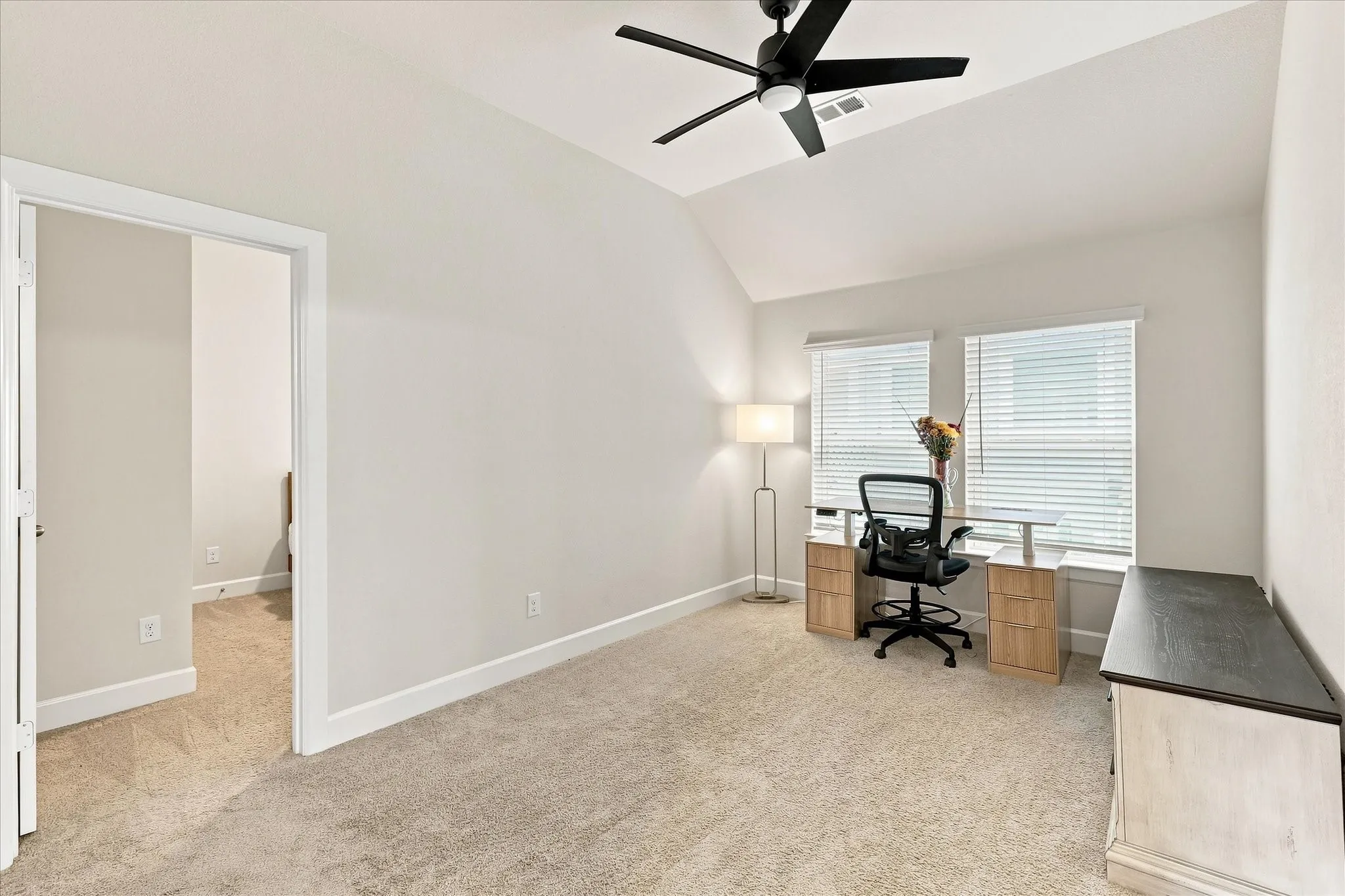 This flex space is situated between two secondary bedrooms and would make a great playroom, school room or gameroom!