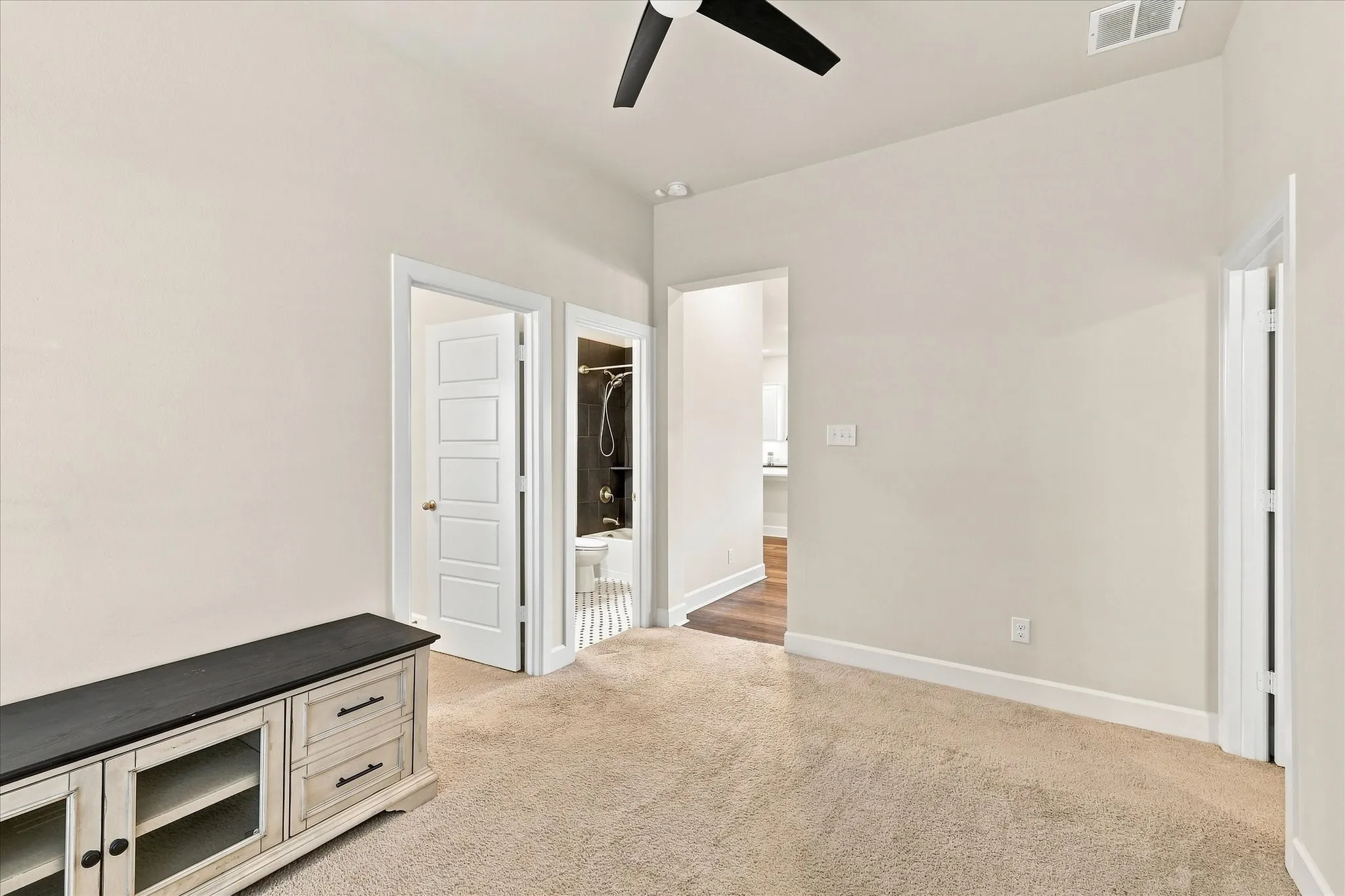 This flex space is situated between two secondary bedrooms and would make a great playroom, school room or gameroom!