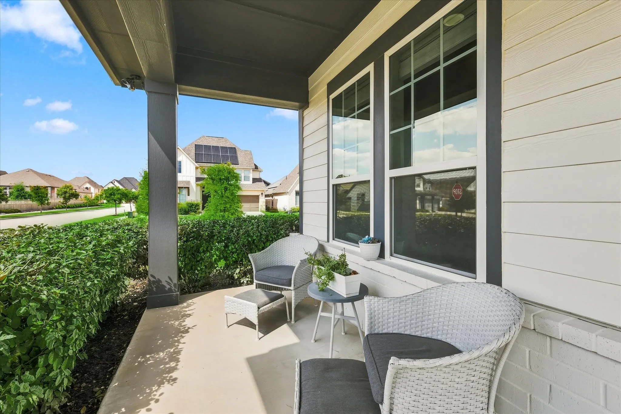 Enjoy your front porch with your favorite book and beverage