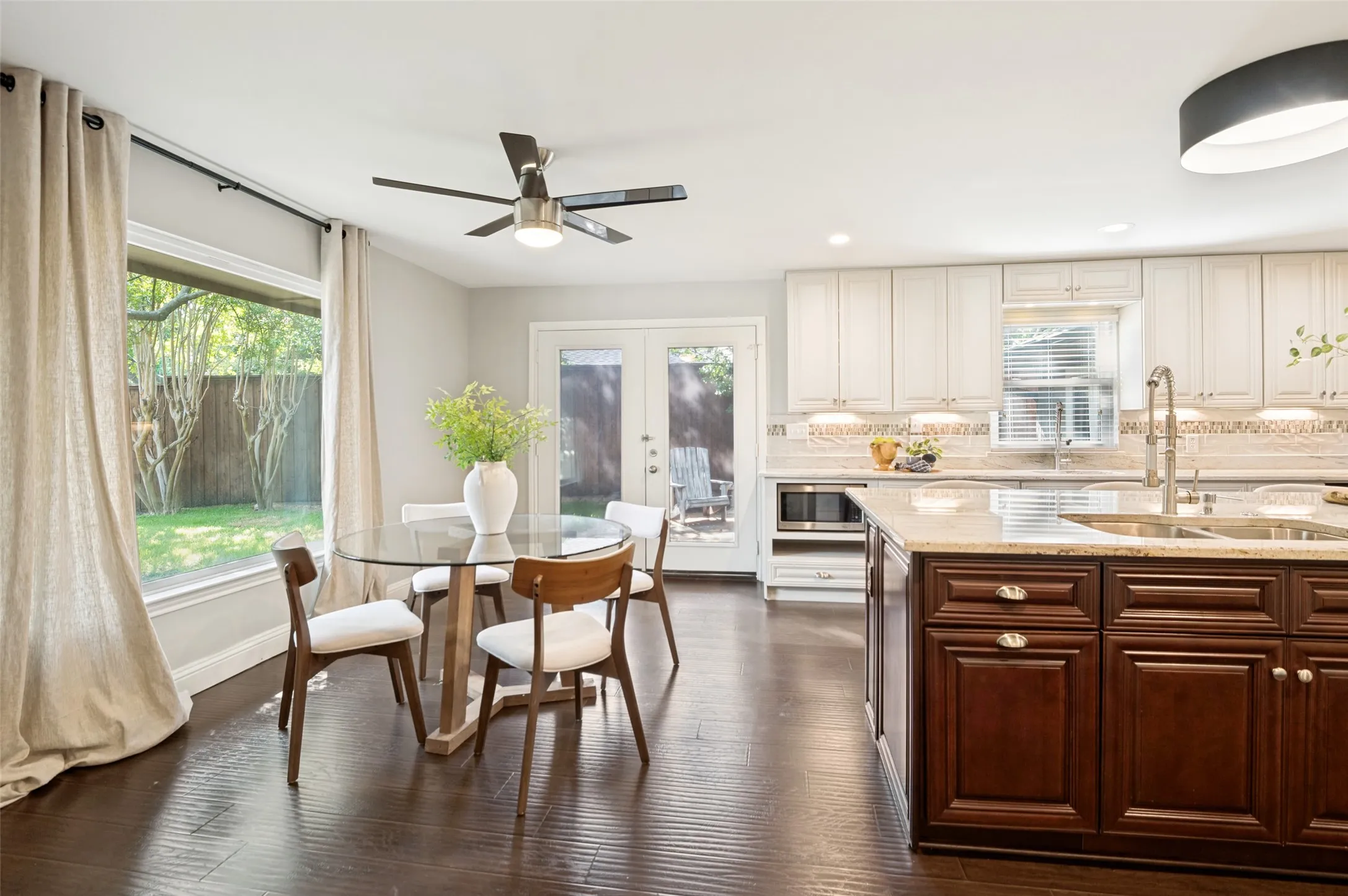 Spacious breakfast area leads to the pation for grilling and outdoor seating.