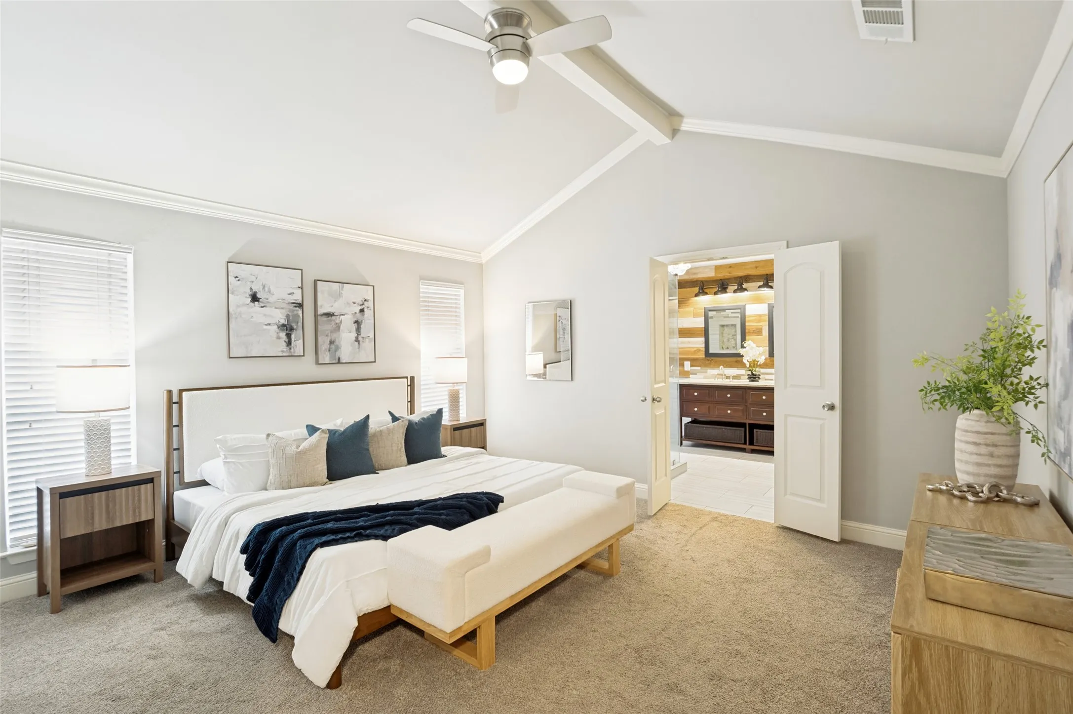 The vaulted ceiling enhances the primary suite.