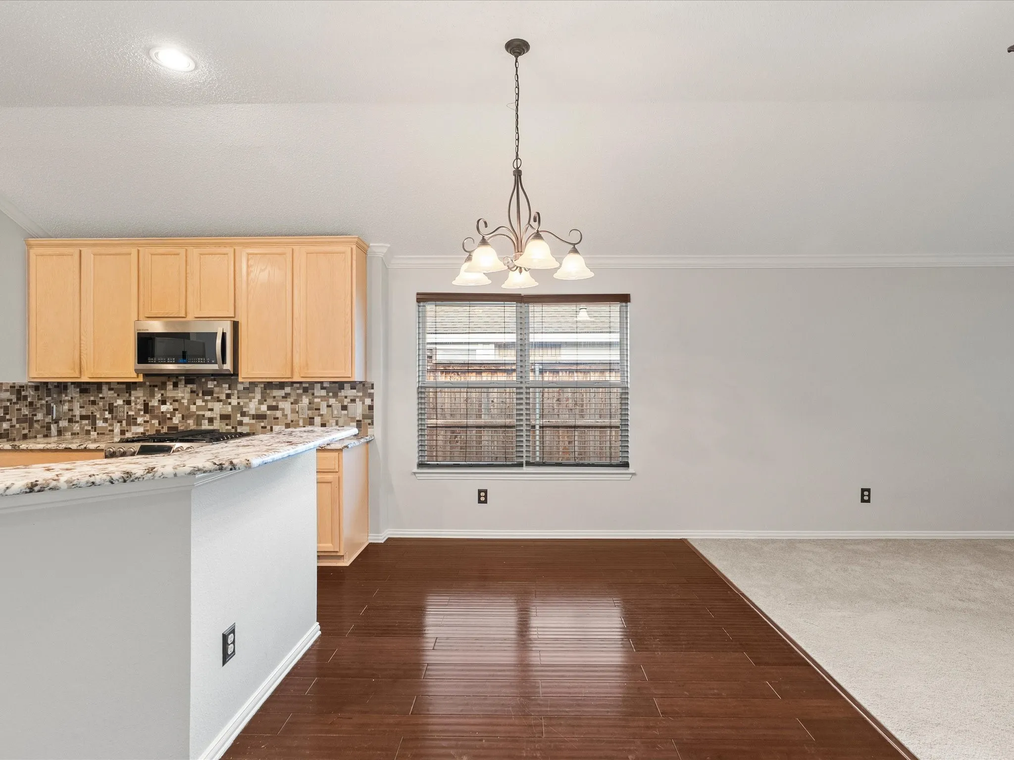 Hardwood flooring and breakfast area for table