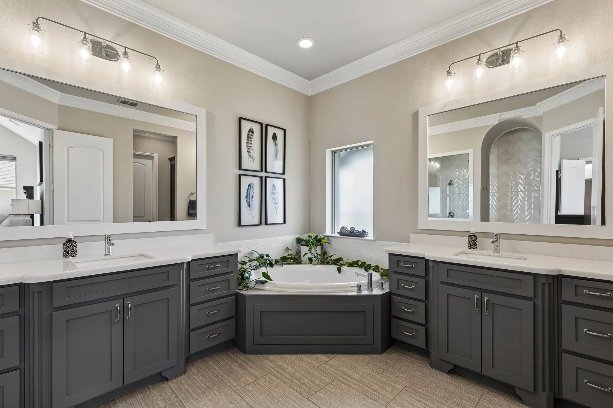 Double vanities and huge soaking tub.
