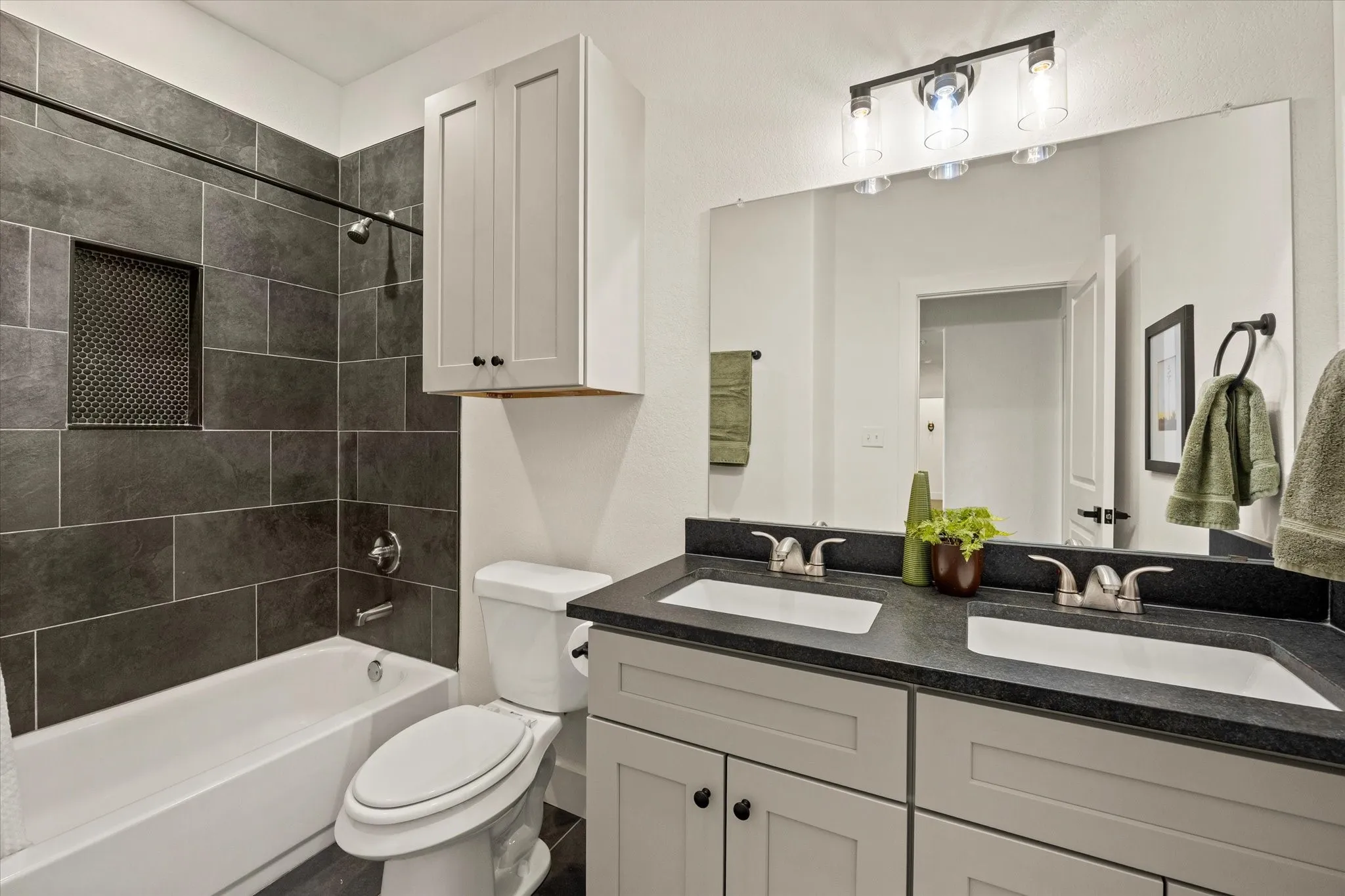 Shared bath is between the two secondard bedrooms.