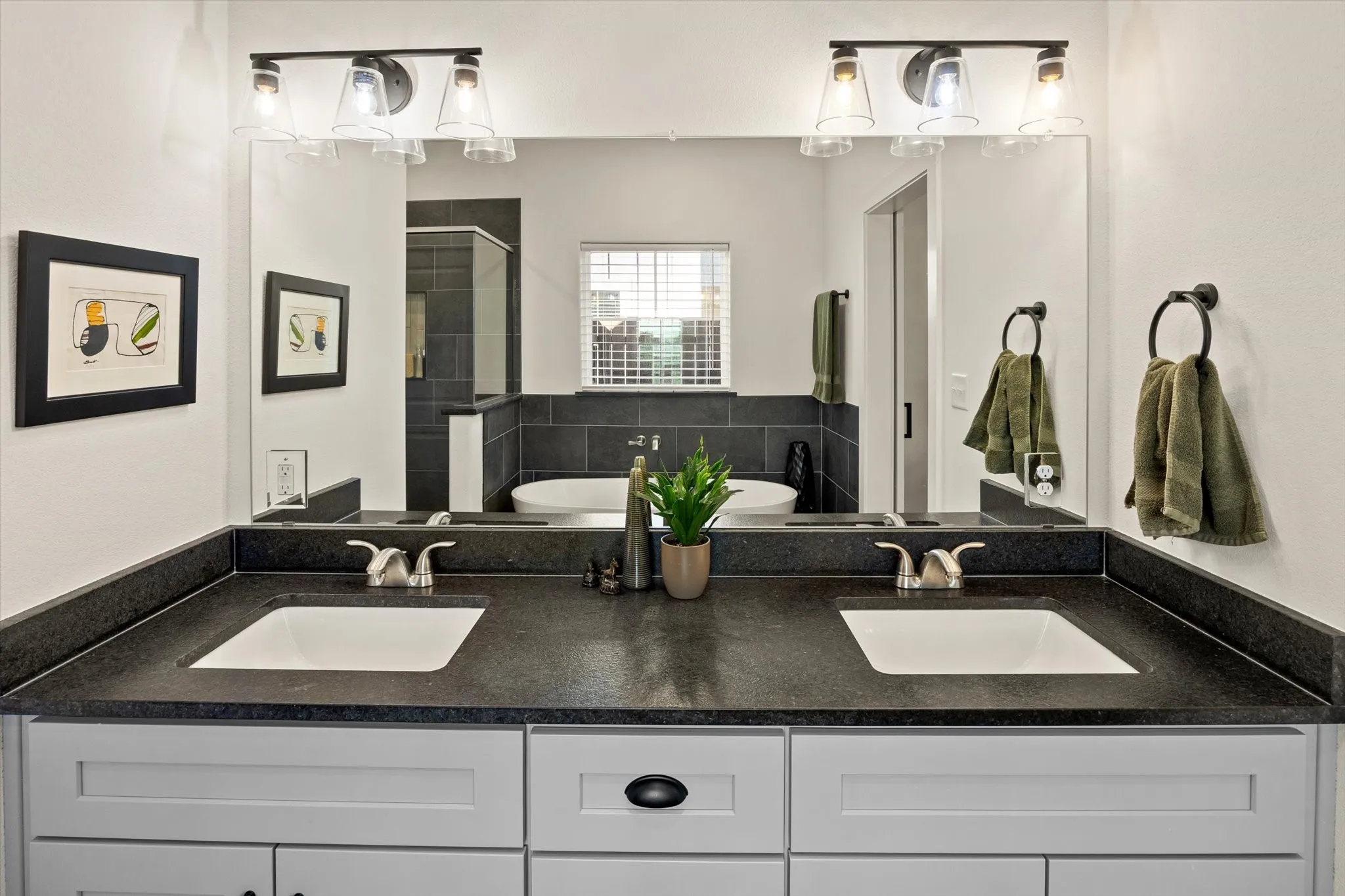 Double vanity, separate bath, and lots of room.