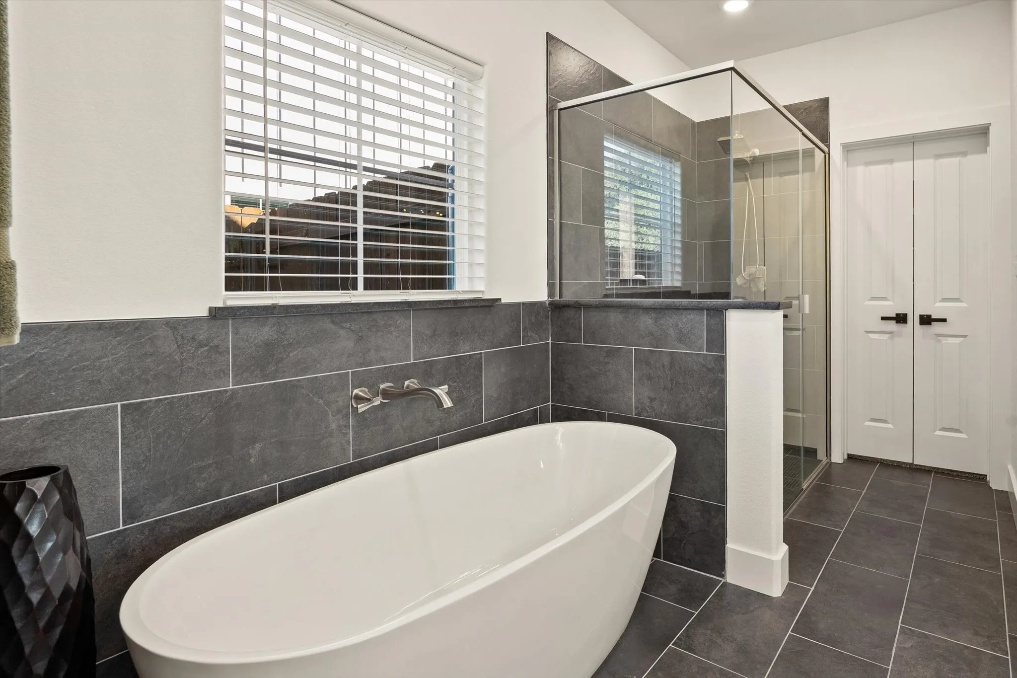 Separate shower and designer tub.