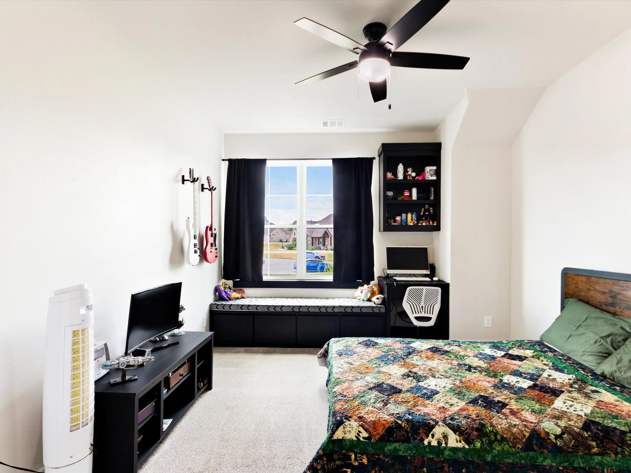2nd floor bedroom with built-in shelving