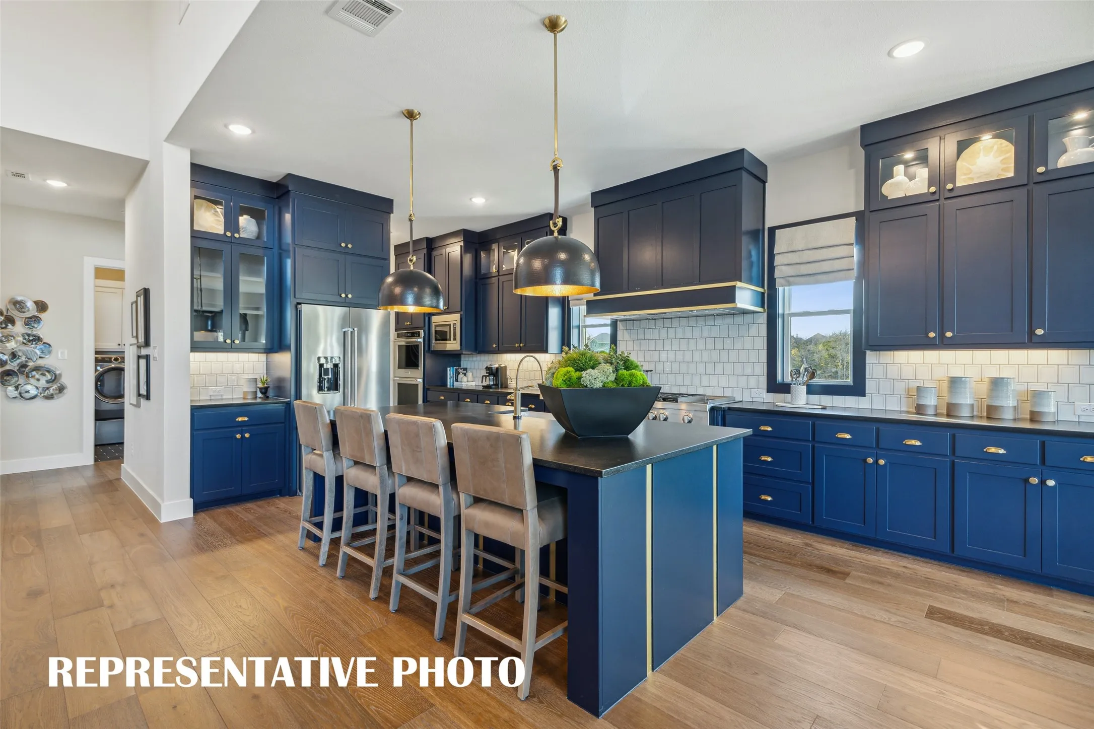 Our Madison II floor plan offers a dream kitchen with tons of space and style!  REPRESENTATIVE PHOTO